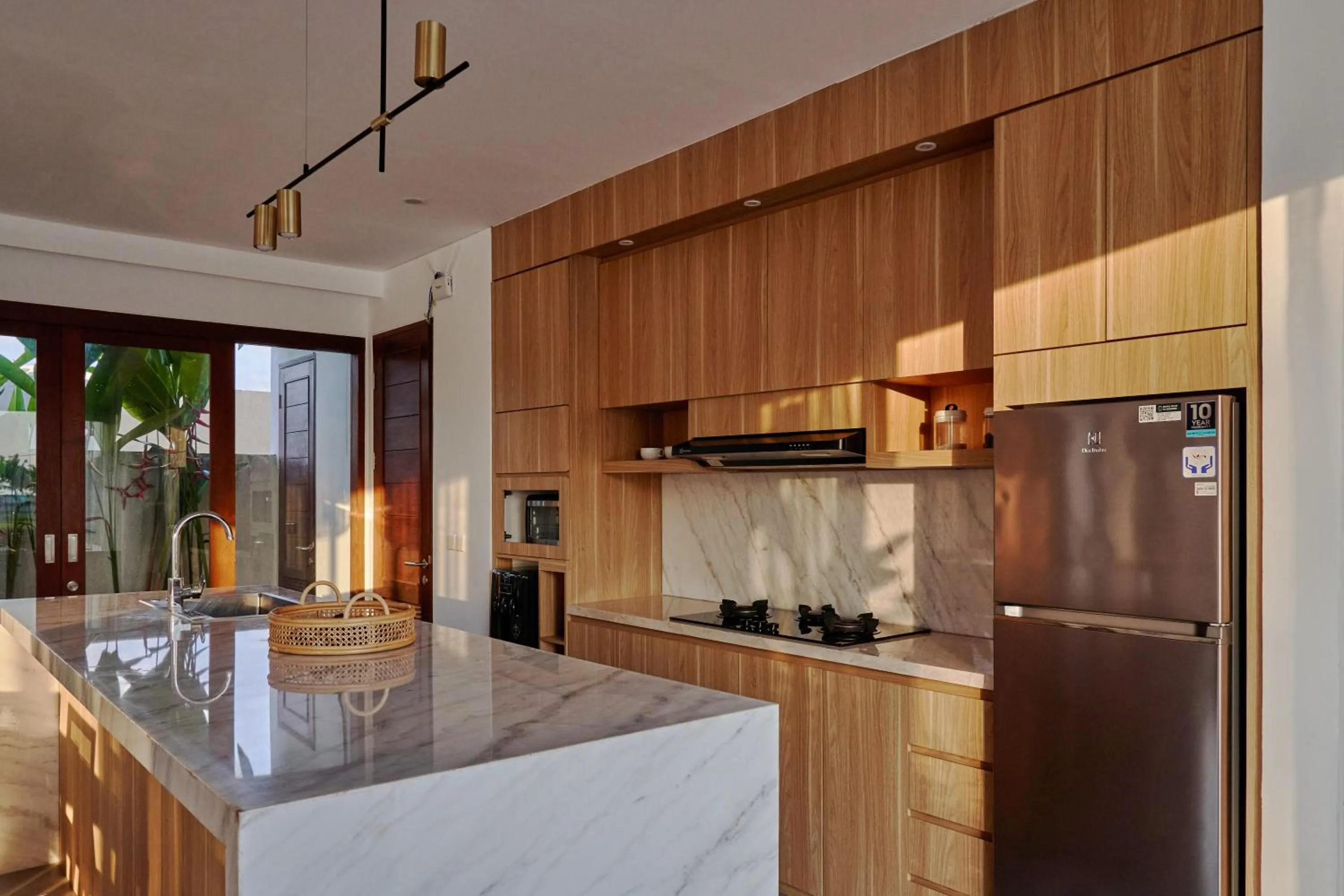 Kitchen or kitchenette in Om Cemagi Beach Villa Canggu