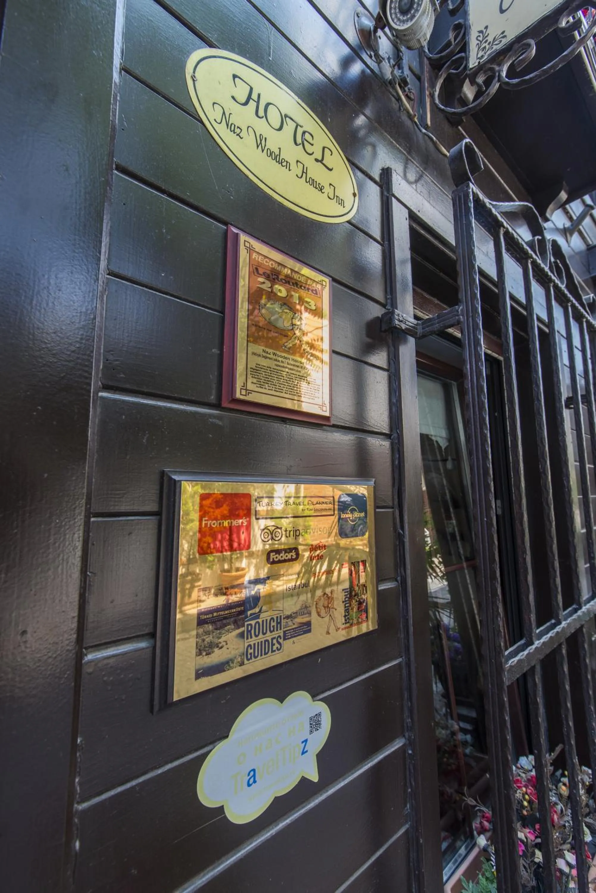 Property logo or sign in Naz Wooden House Inn