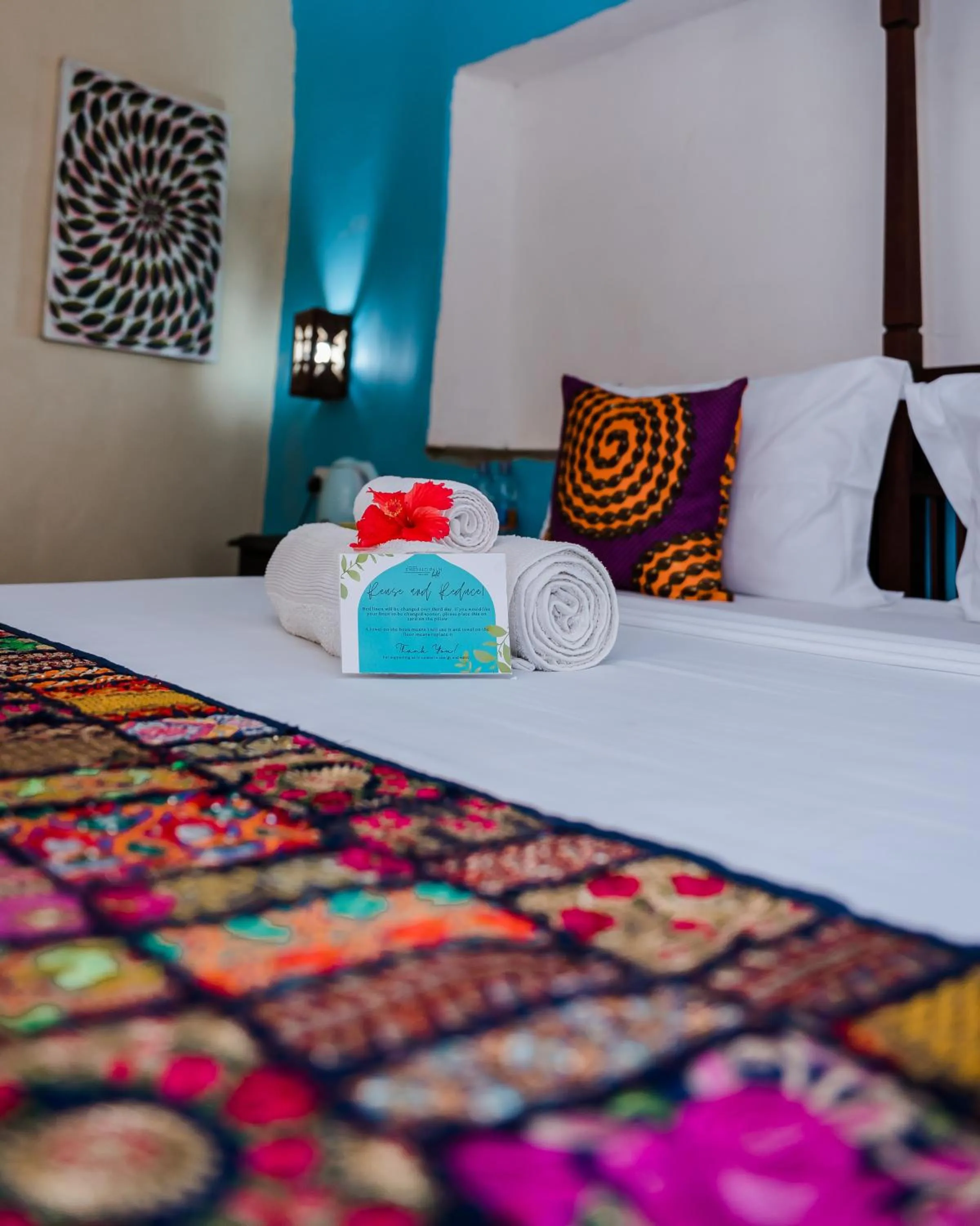 Bed in Emerald Palm Boutique Hotel