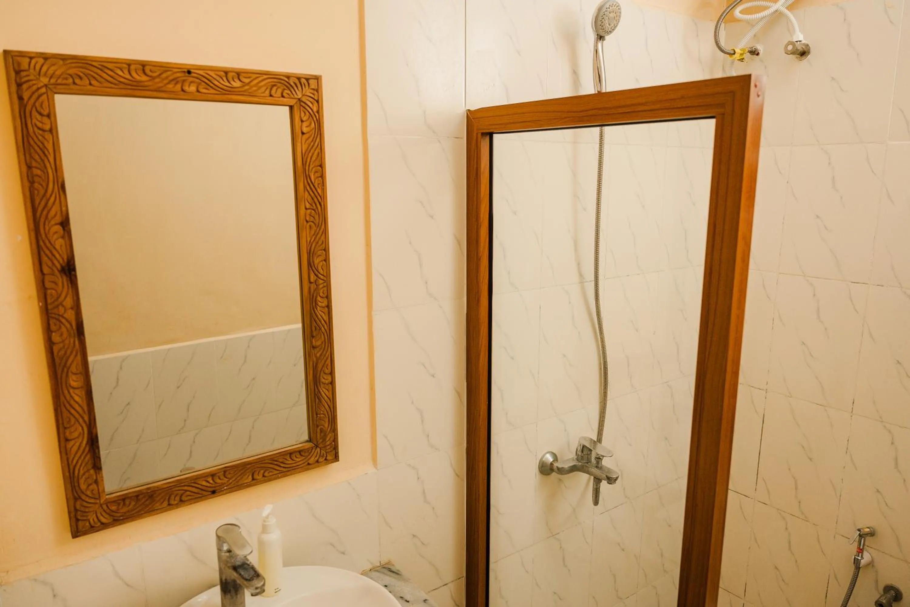 Bathroom in Emerald Palm Boutique Hotel