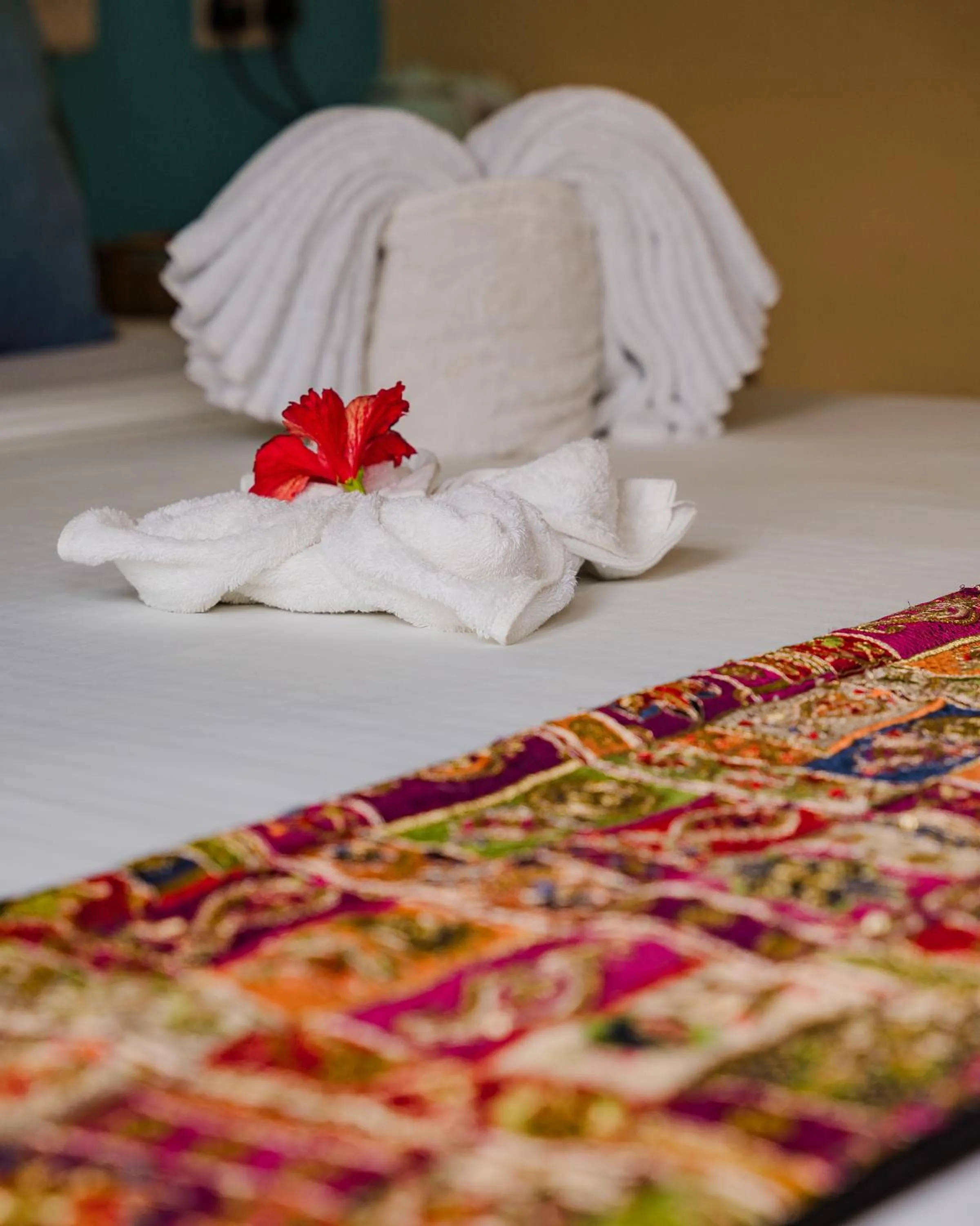 Decorative detail, Bed in Emerald Palm Boutique Hotel