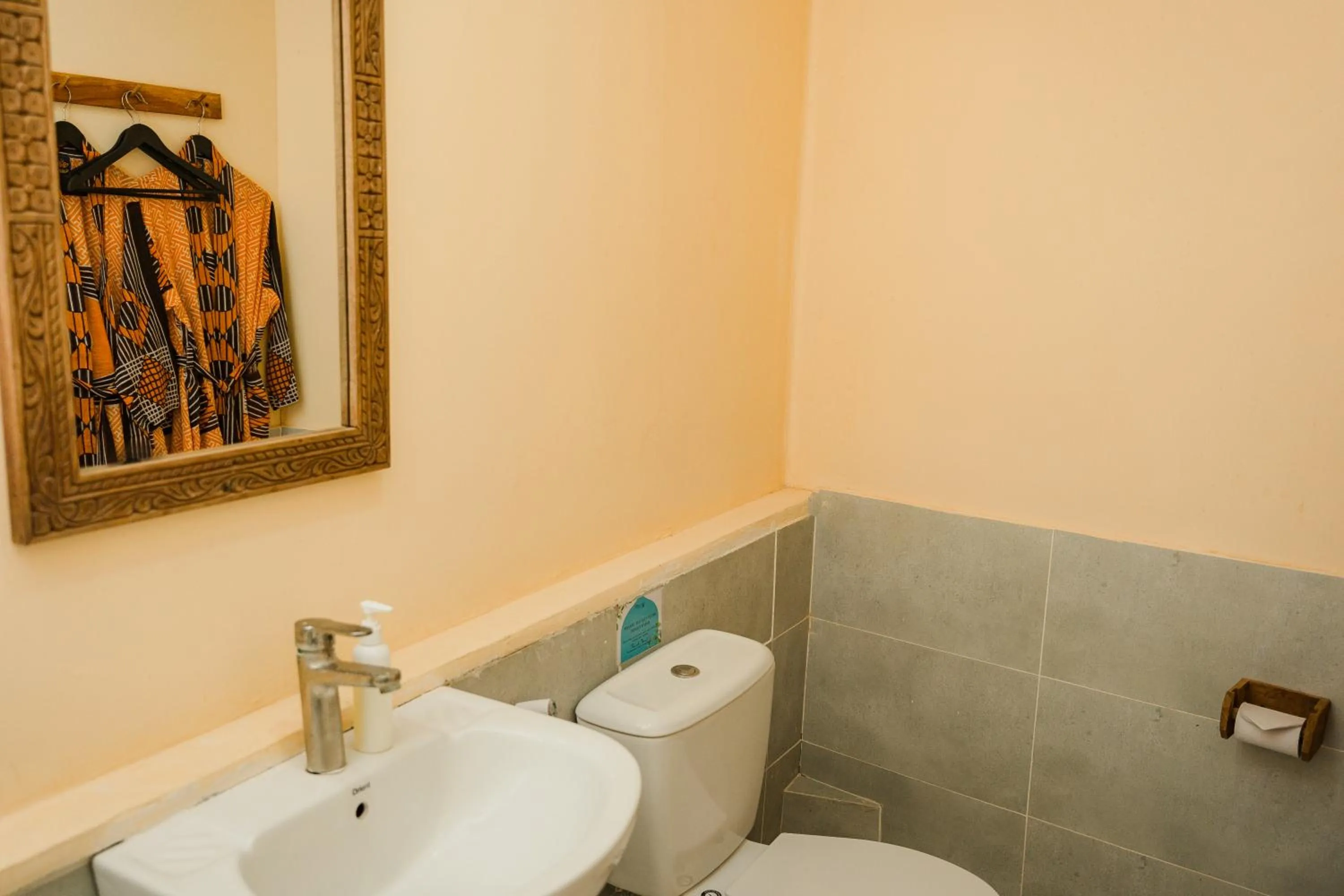 Toilet in Emerald Palm Boutique Hotel