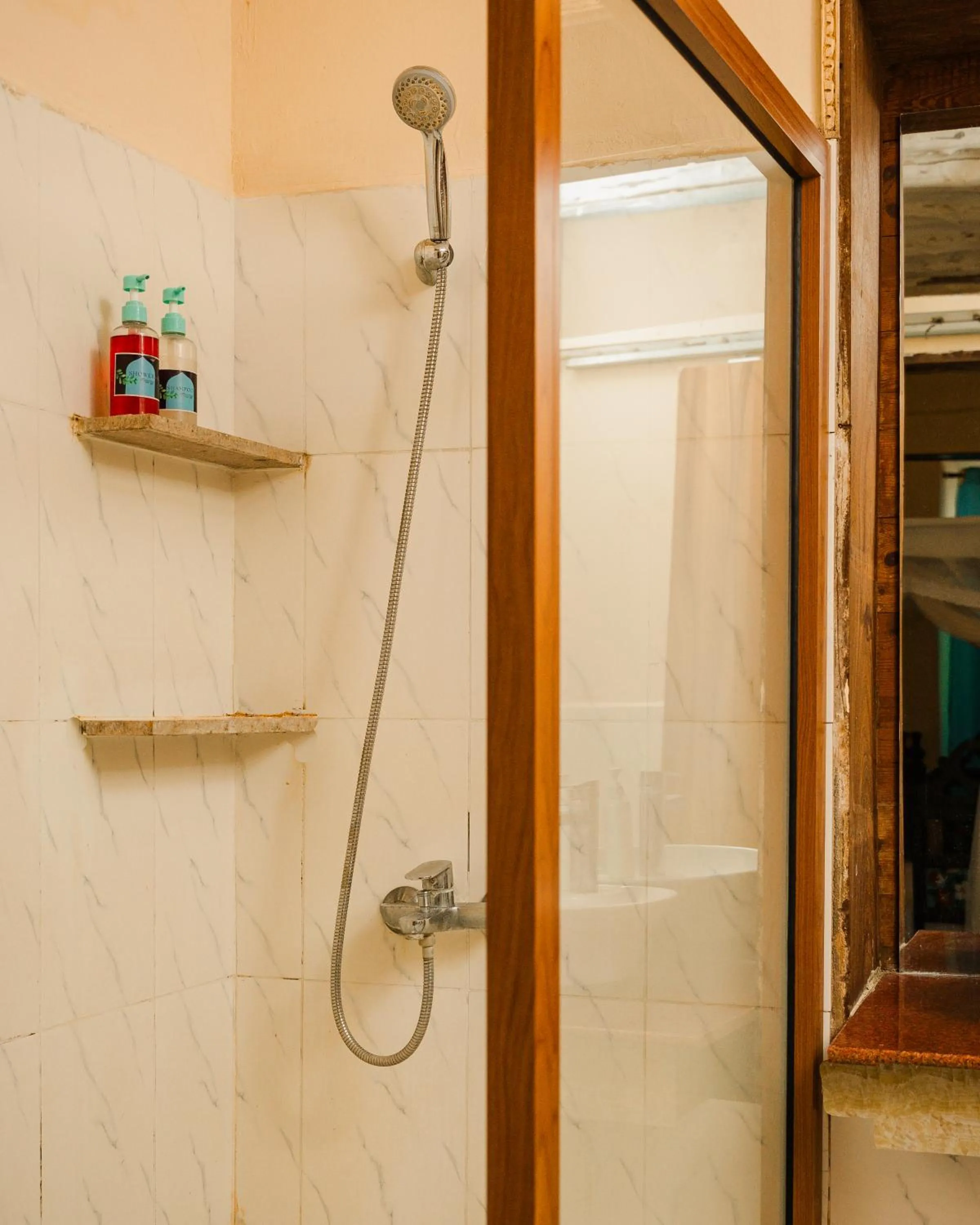 Shower in Emerald Palm Boutique Hotel