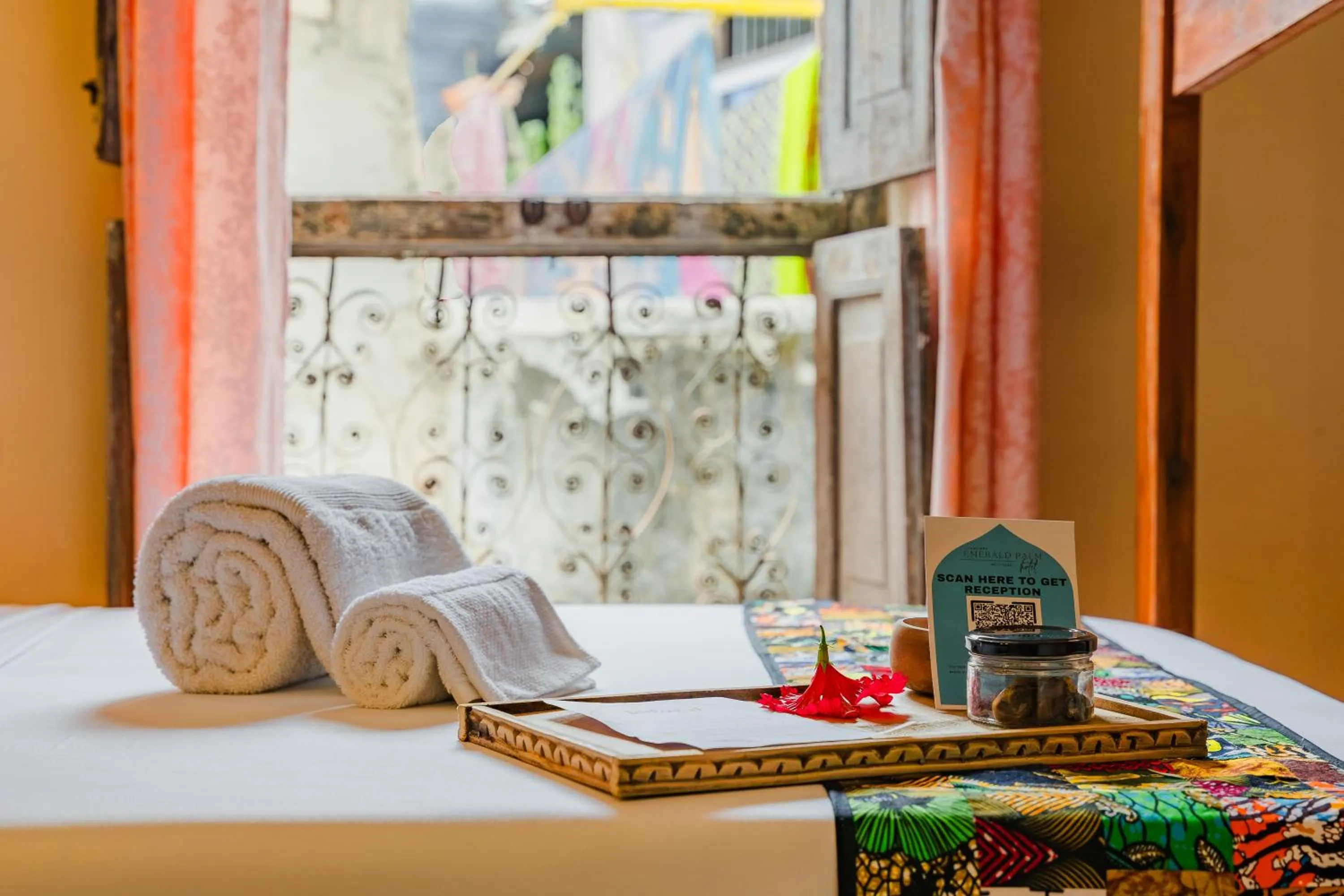 Bed in Emerald Palm Boutique Hotel