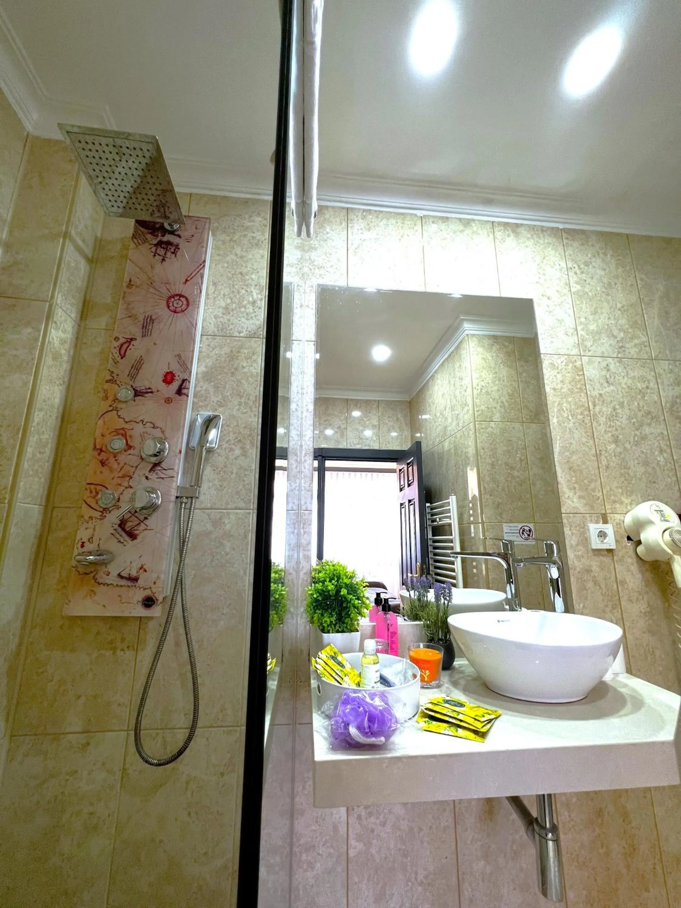 Shower in Angel's Home Hotel - Angel Group Hotels