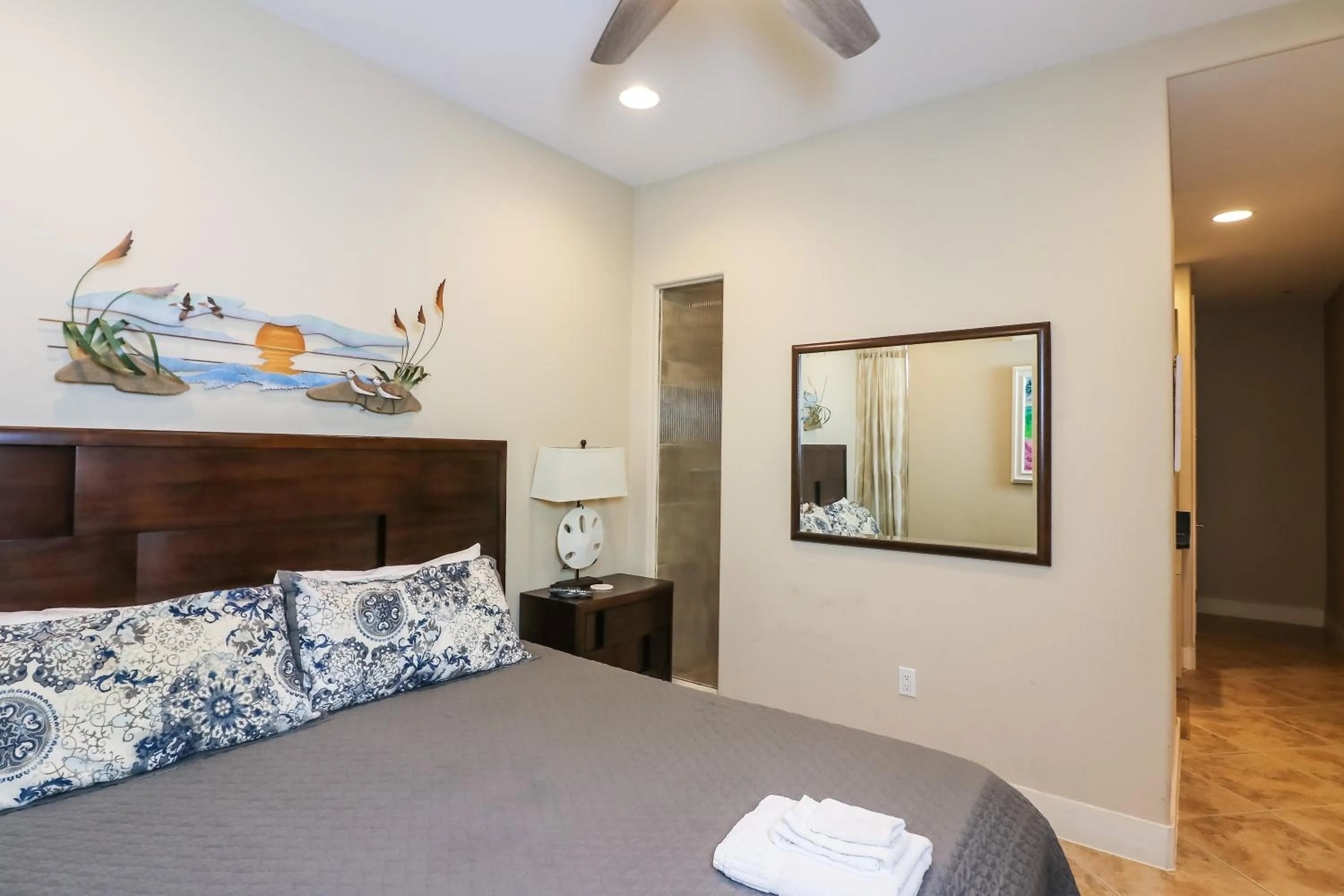 Bed in Beachfront Laid Back and Luxurious Diamond Beach Condo - Amazing Pools Amenities