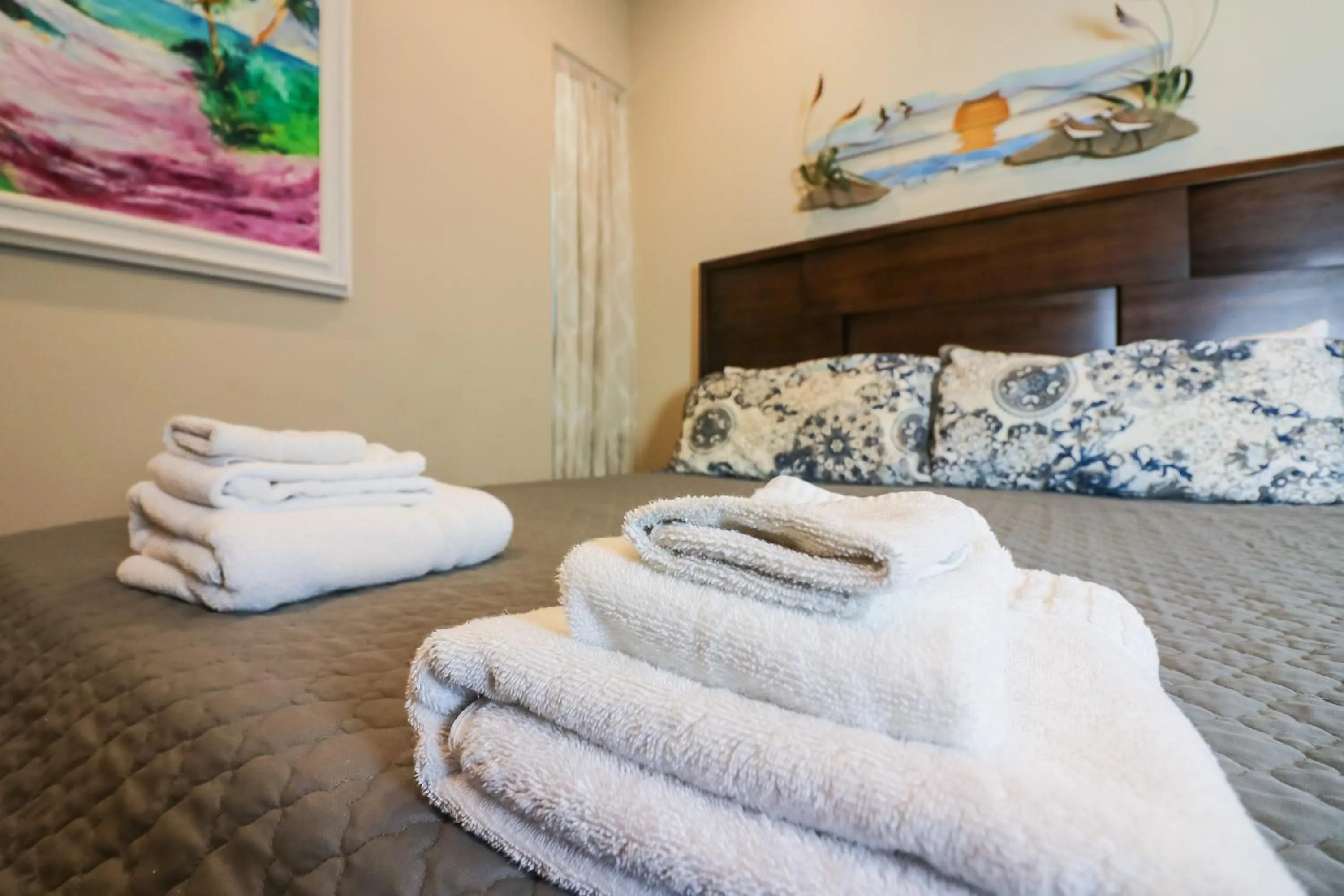 Bed in Beachfront Laid Back and Luxurious Diamond Beach Condo - Amazing Pools Amenities
