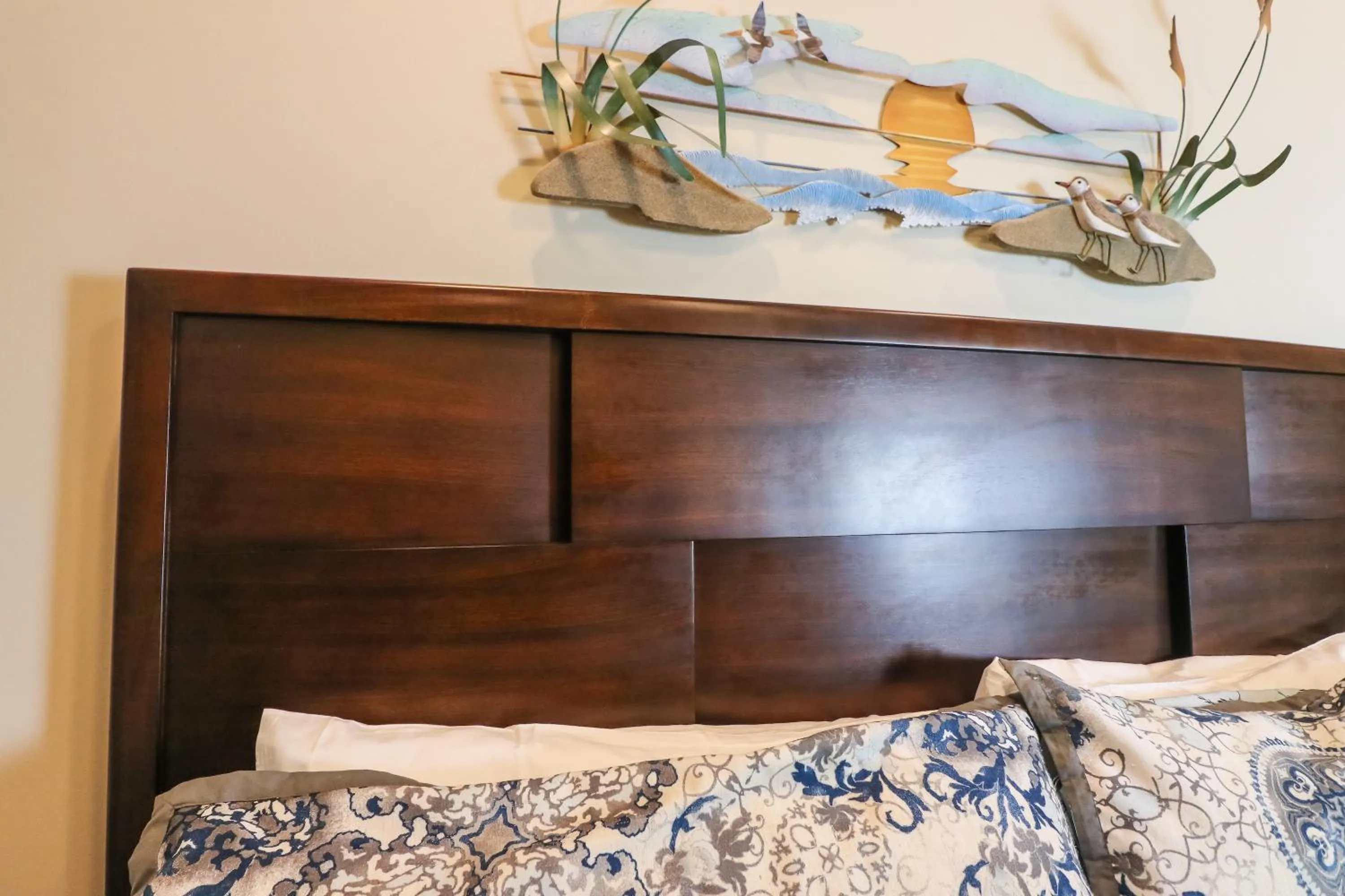 Bed in Beachfront Laid Back and Luxurious Diamond Beach Condo - Amazing Pools Amenities