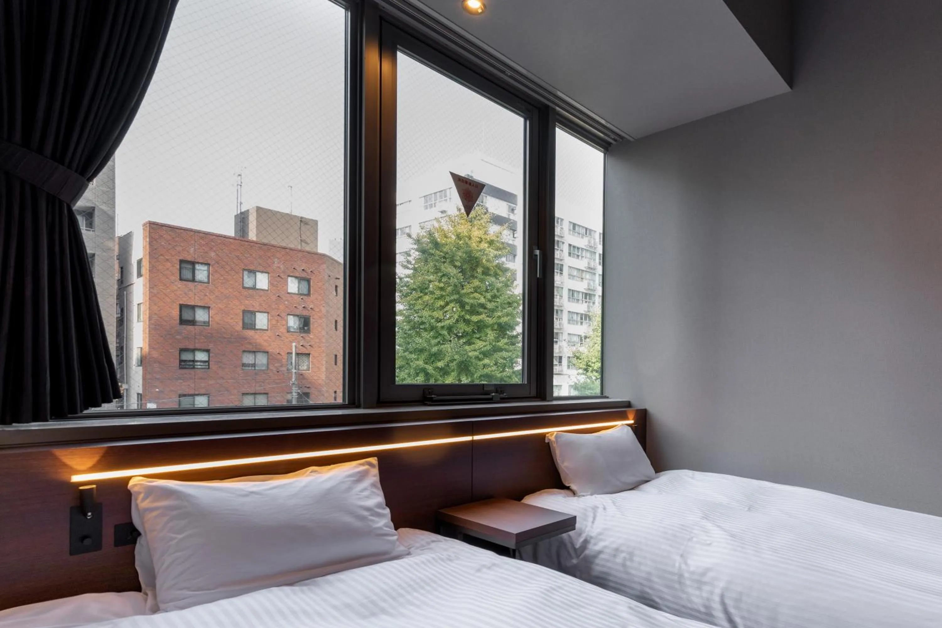 Bed in COCOSHUKU Shinjuku-Hanazono