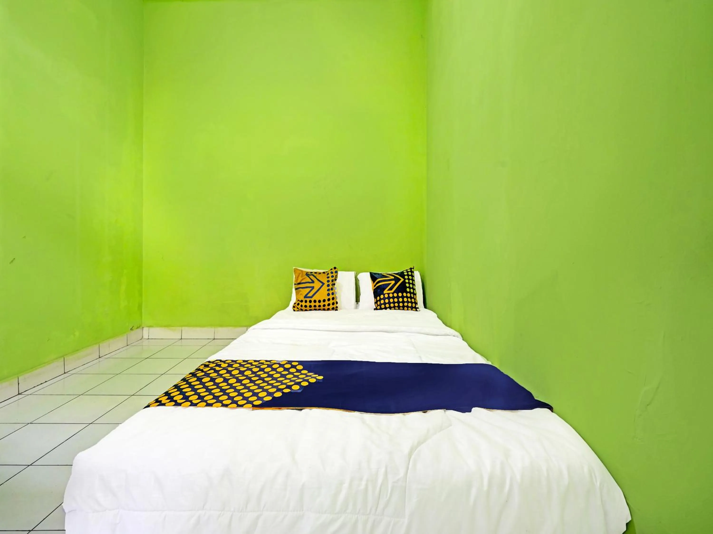 Bedroom in SPOT ON 91325 Pondok Hijau Guest House Syariah