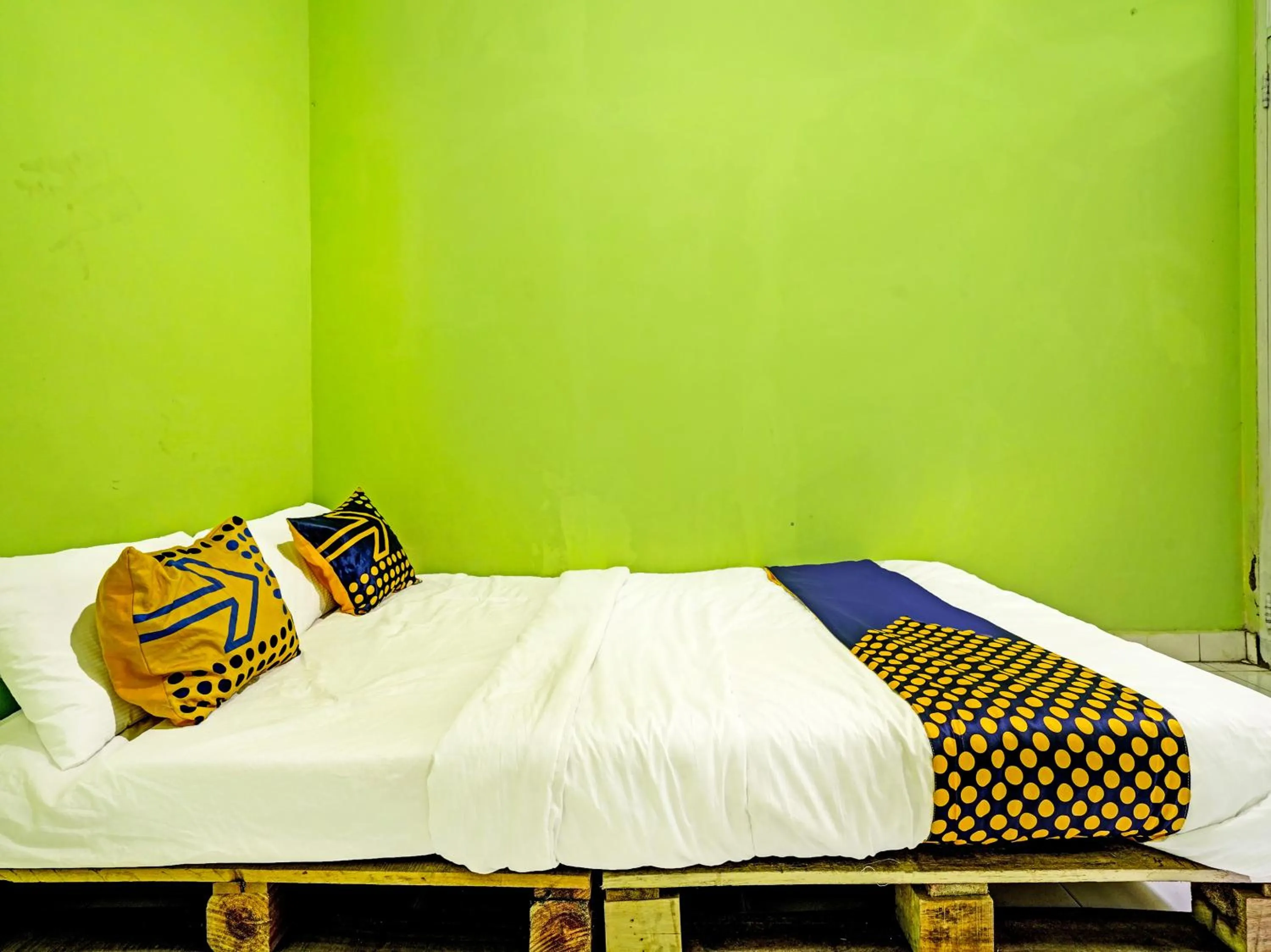 Bedroom in SPOT ON 91325 Pondok Hijau Guest House Syariah