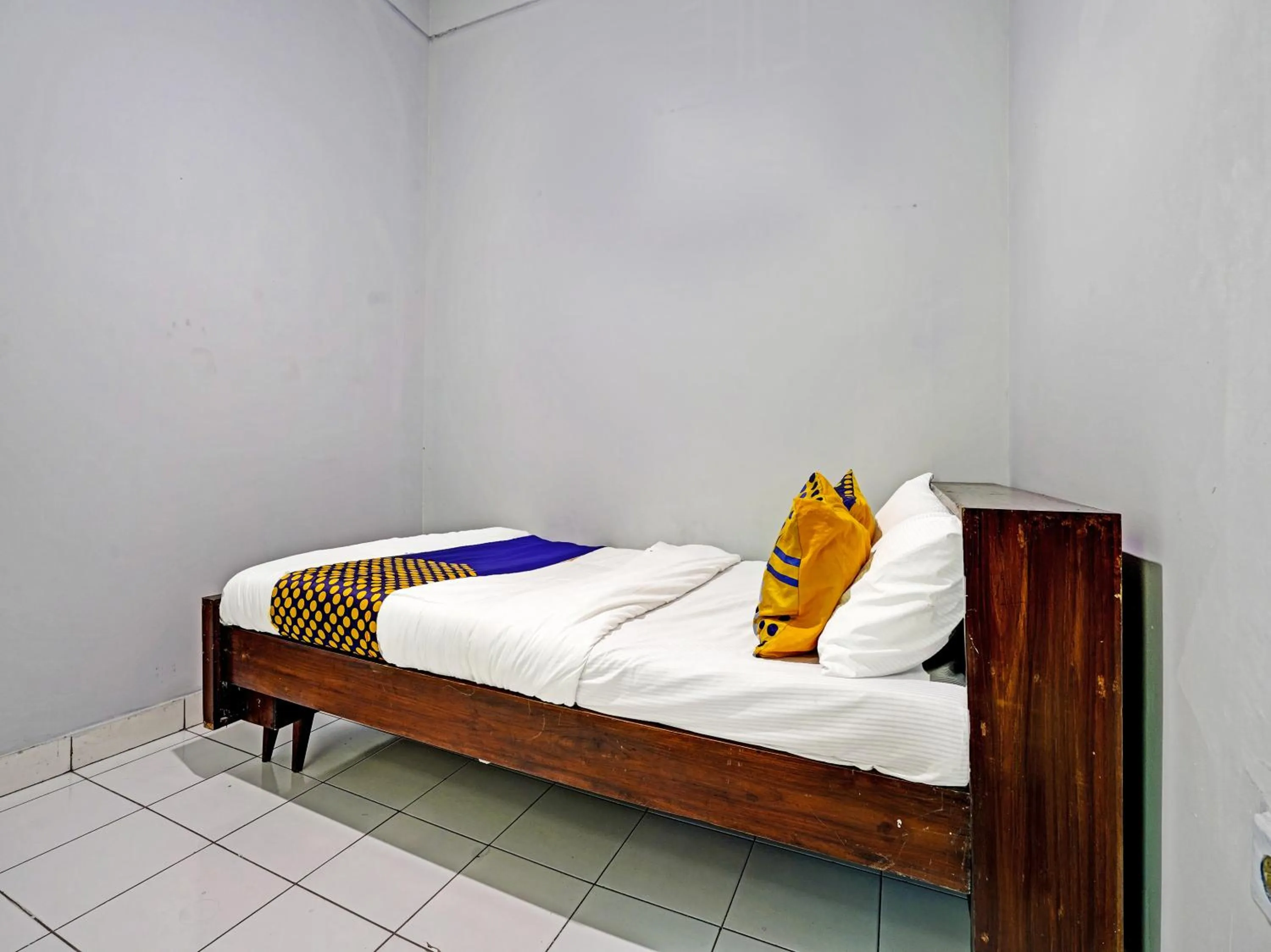 Bedroom in SPOT ON 91325 Pondok Hijau Guest House Syariah