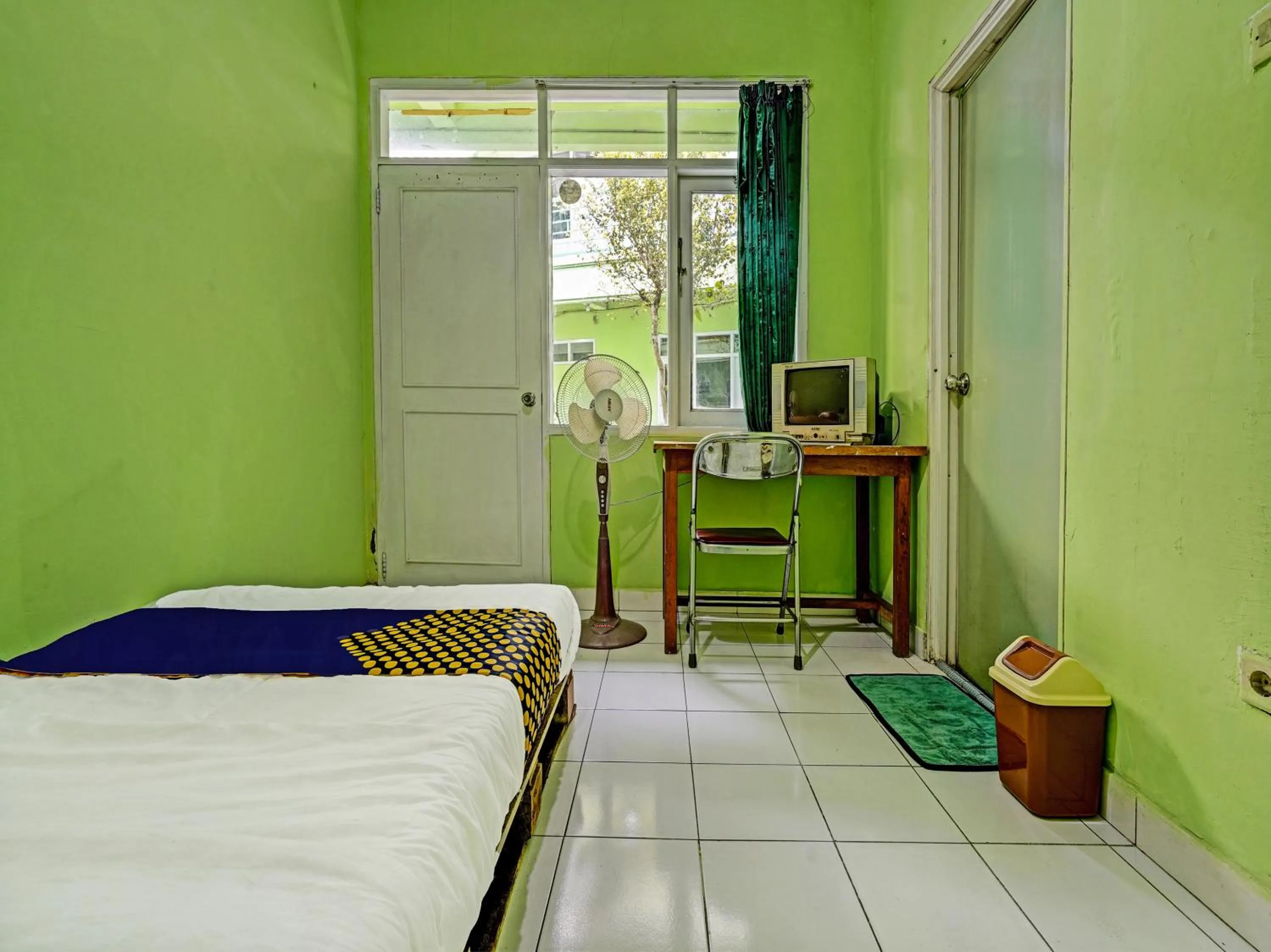 Bedroom in SPOT ON 91325 Pondok Hijau Guest House Syariah