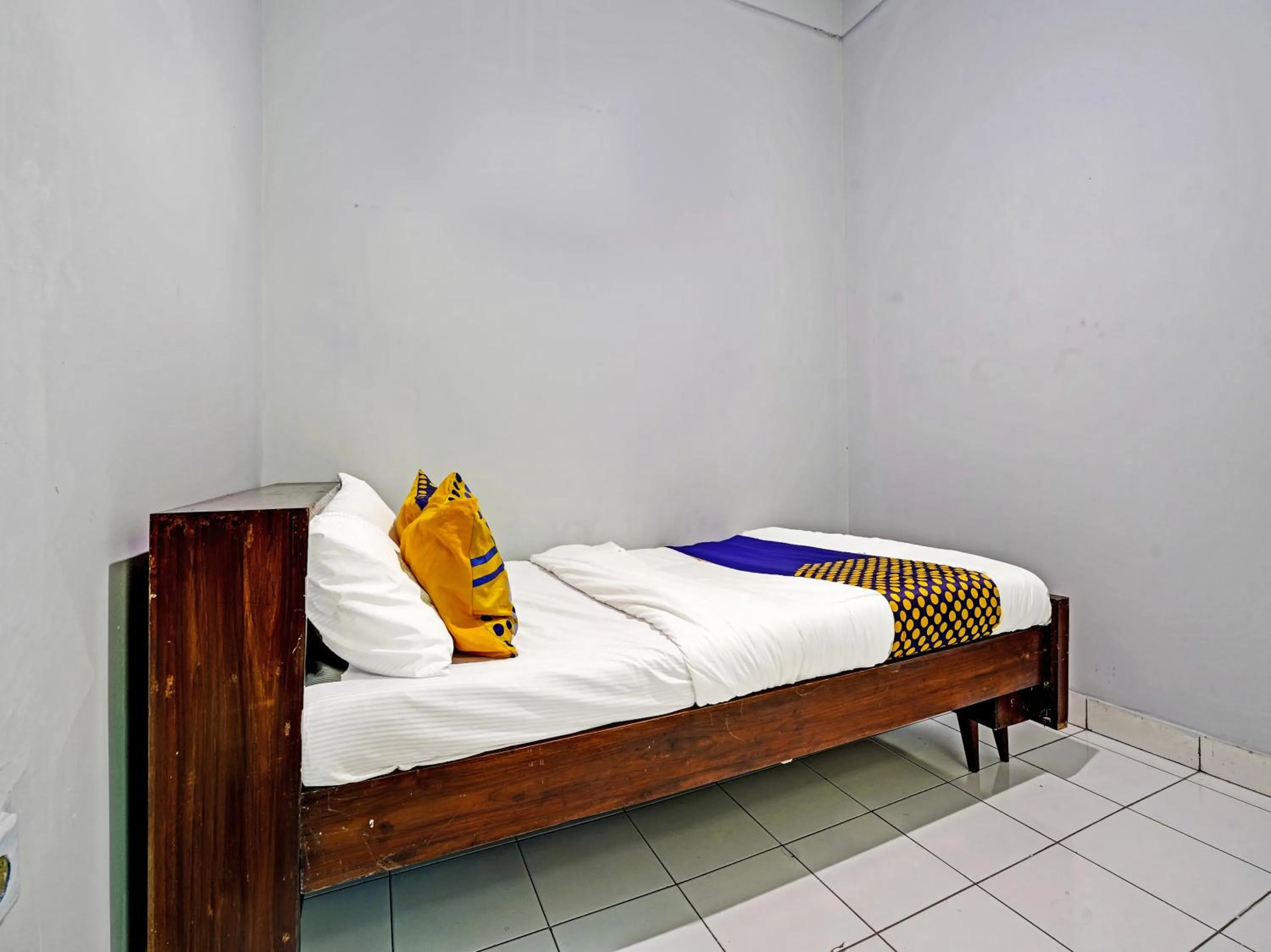 Bedroom in SPOT ON 91325 Pondok Hijau Guest House Syariah