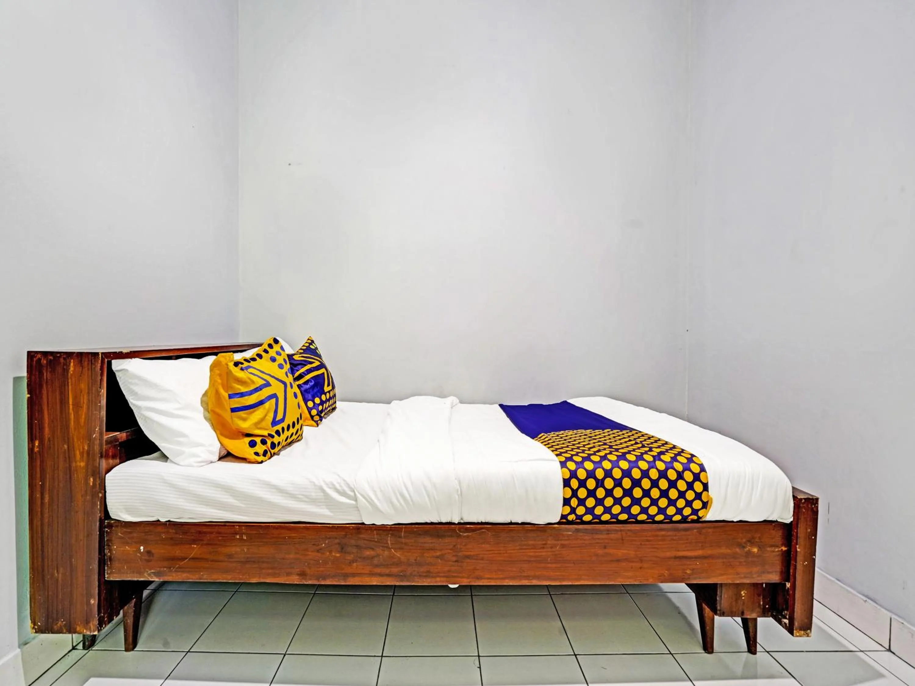 Bedroom in SPOT ON 91325 Pondok Hijau Guest House Syariah