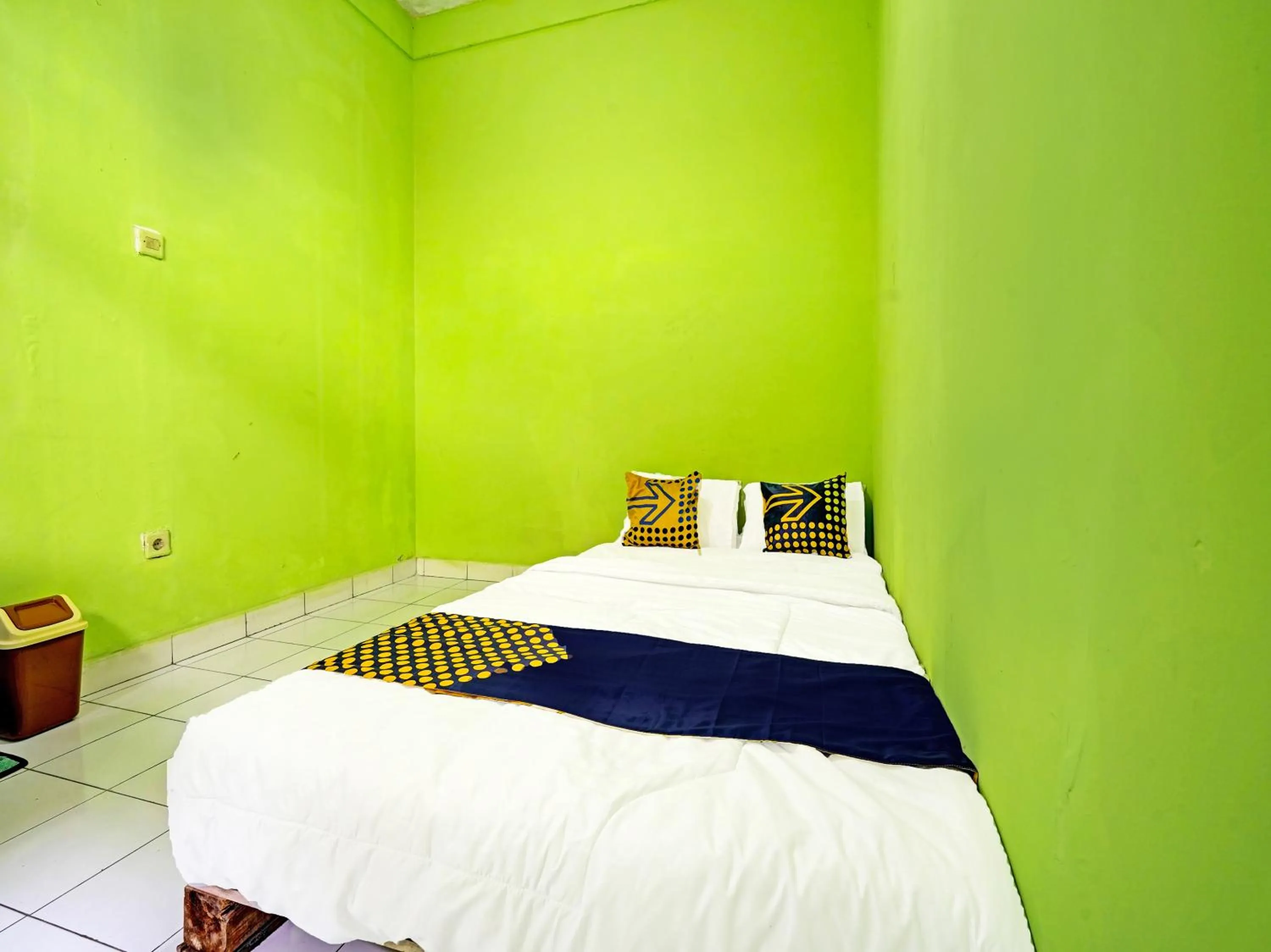 Bedroom in SPOT ON 91325 Pondok Hijau Guest House Syariah
