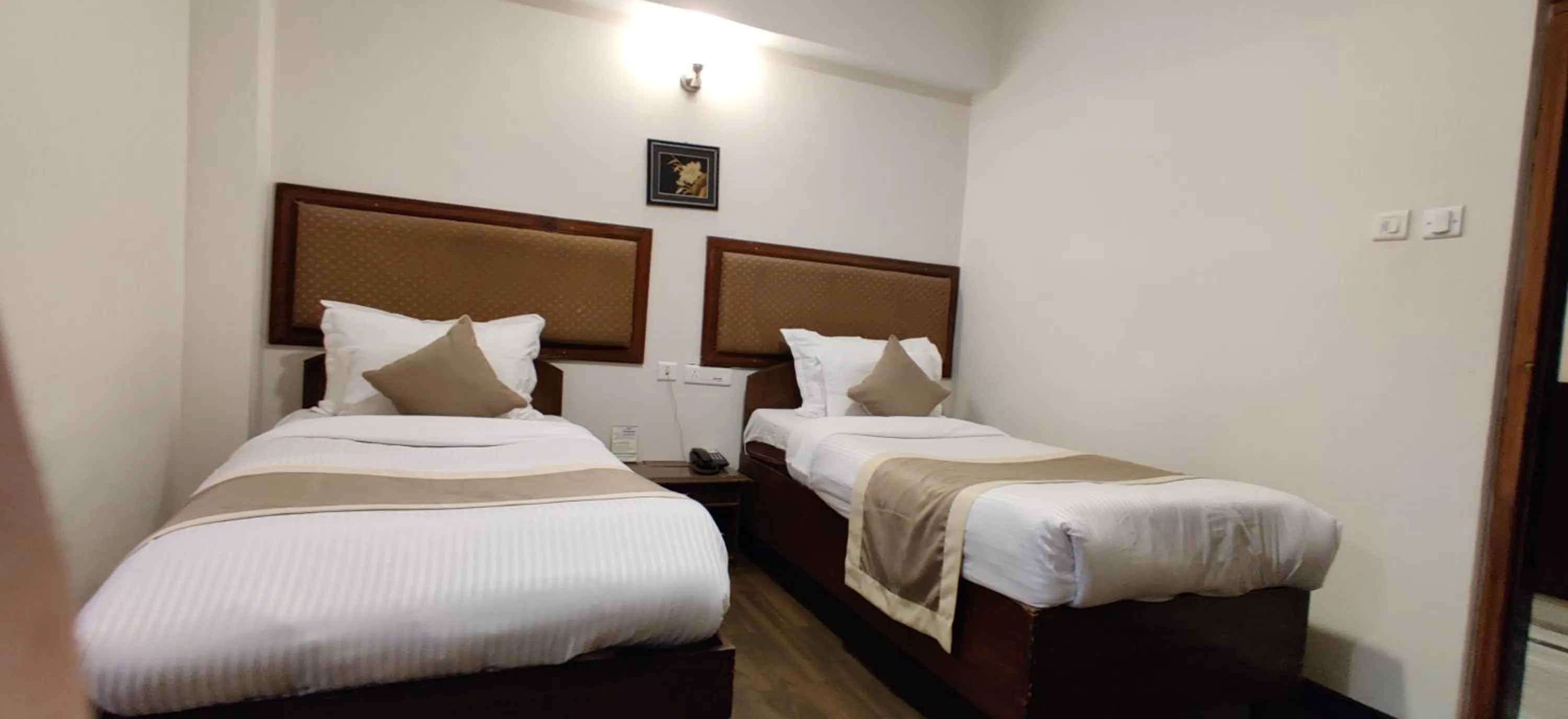 Bed in HOTEL RENDEZVOUS