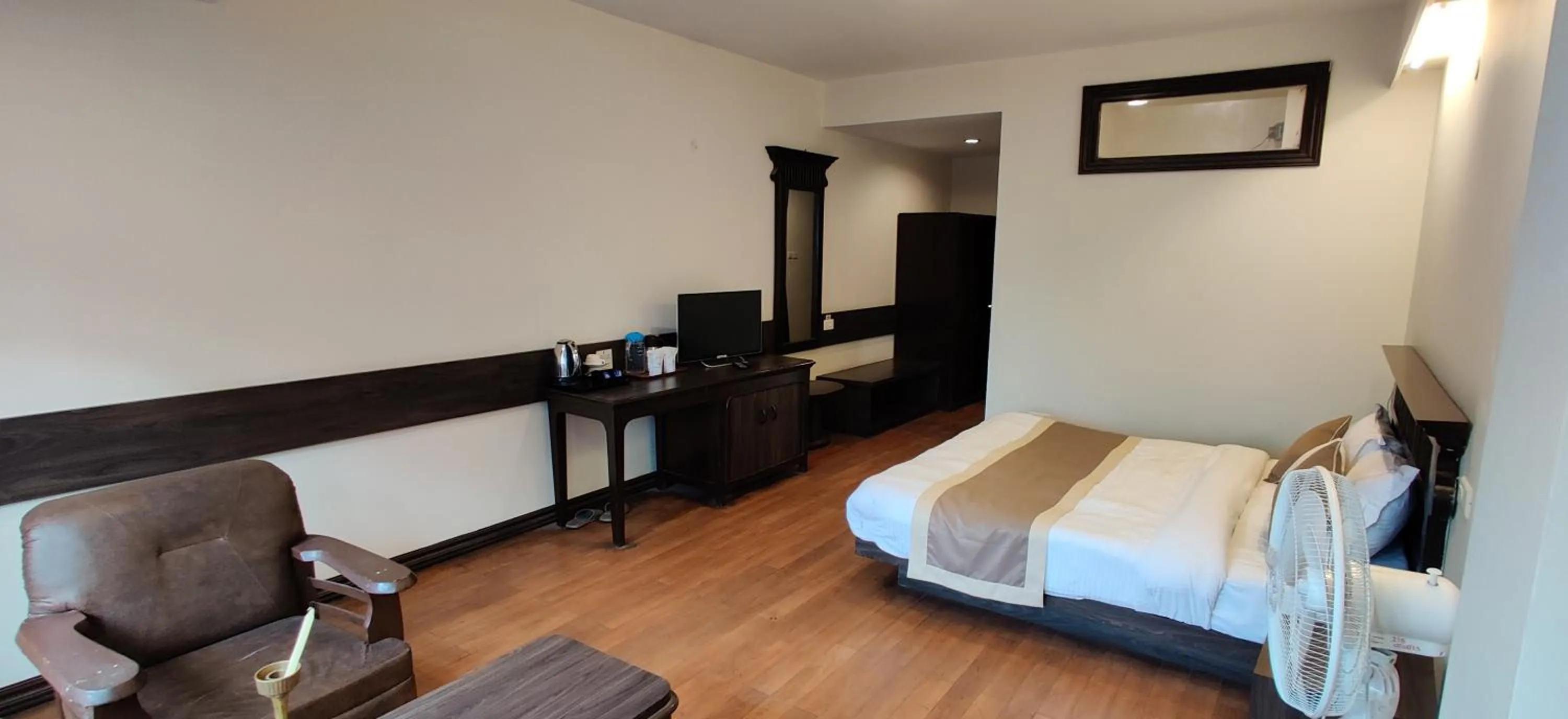 Bed in HOTEL RENDEZVOUS