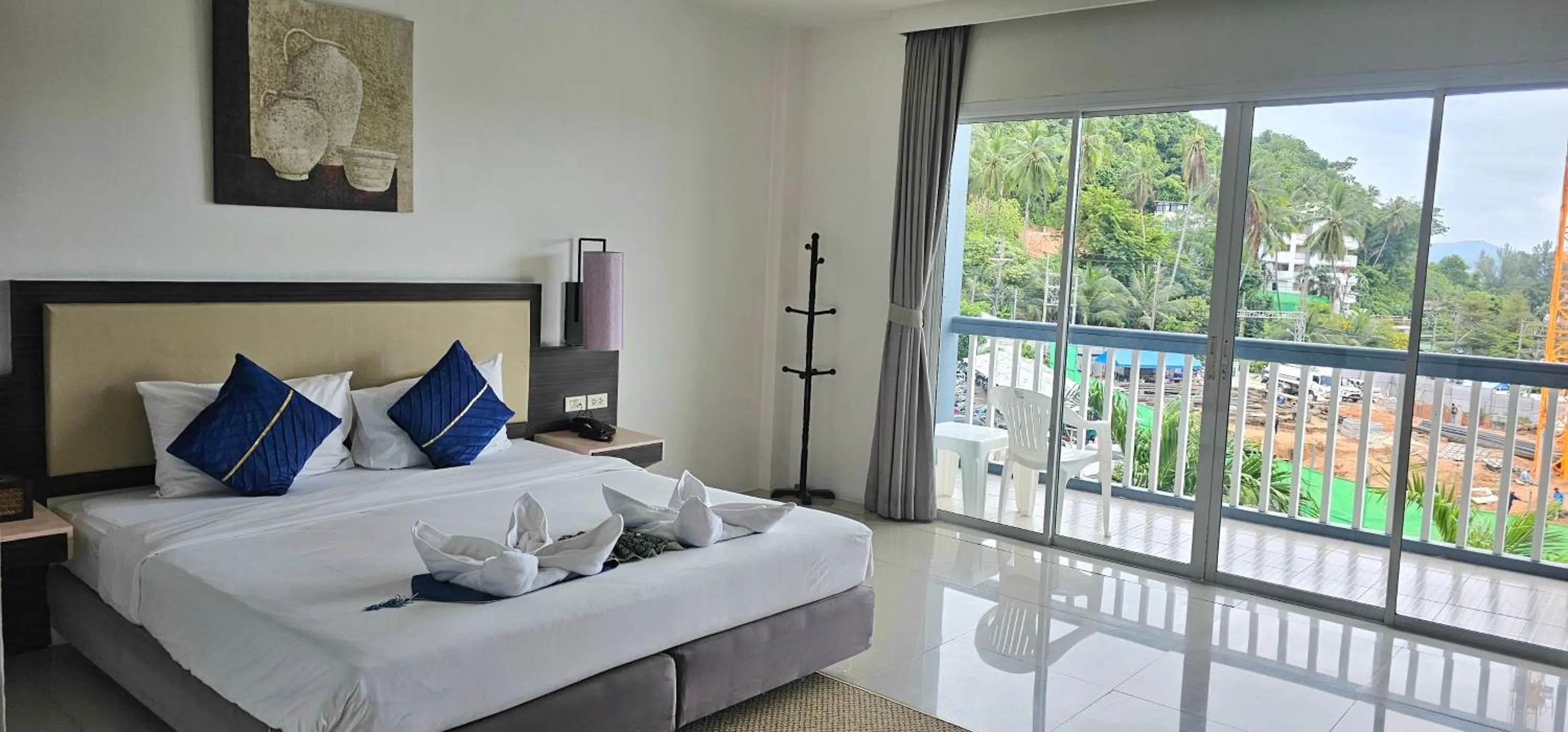 View (from property/room), Bed in AM Surin Place - SHA Extra Plus