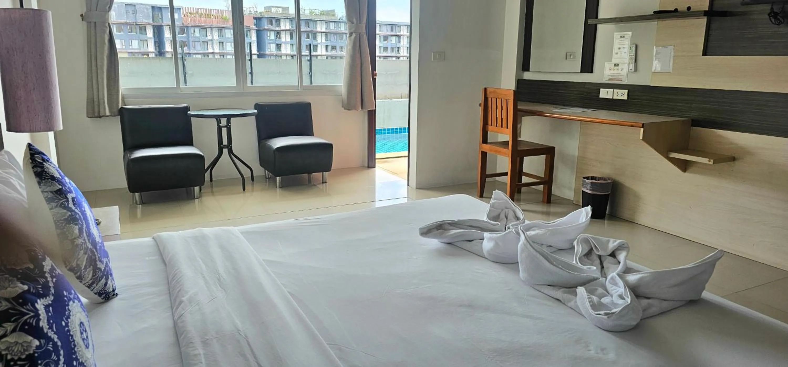 Bedroom, Bed in AM Surin Place - SHA Extra Plus