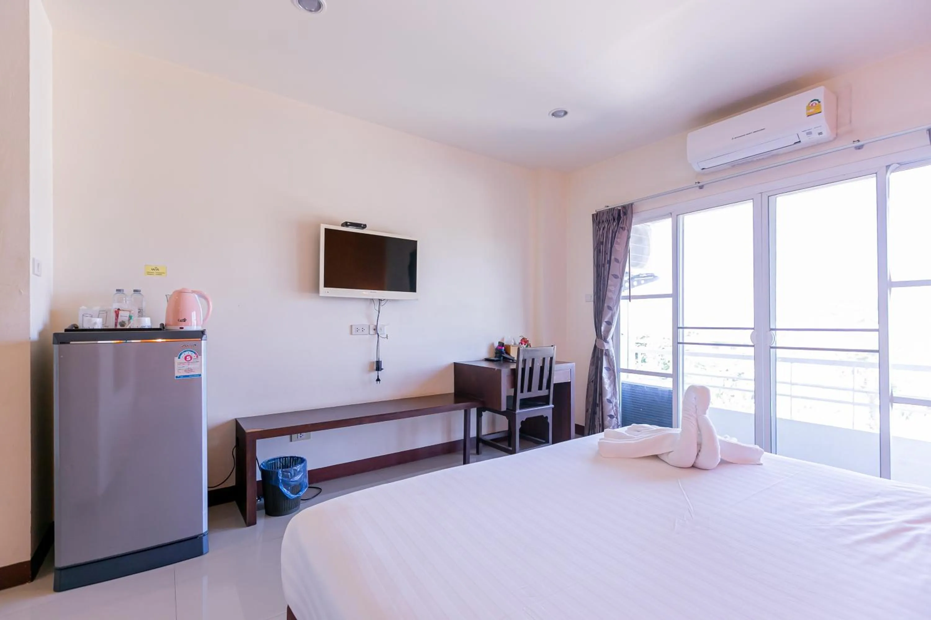 Bed in Panwalee Hotel