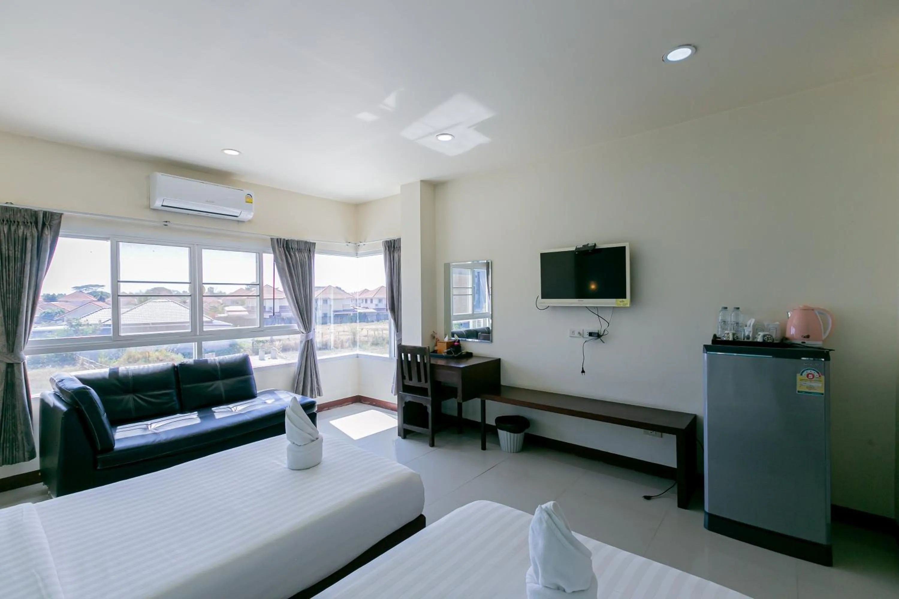 Bed in Panwalee Hotel