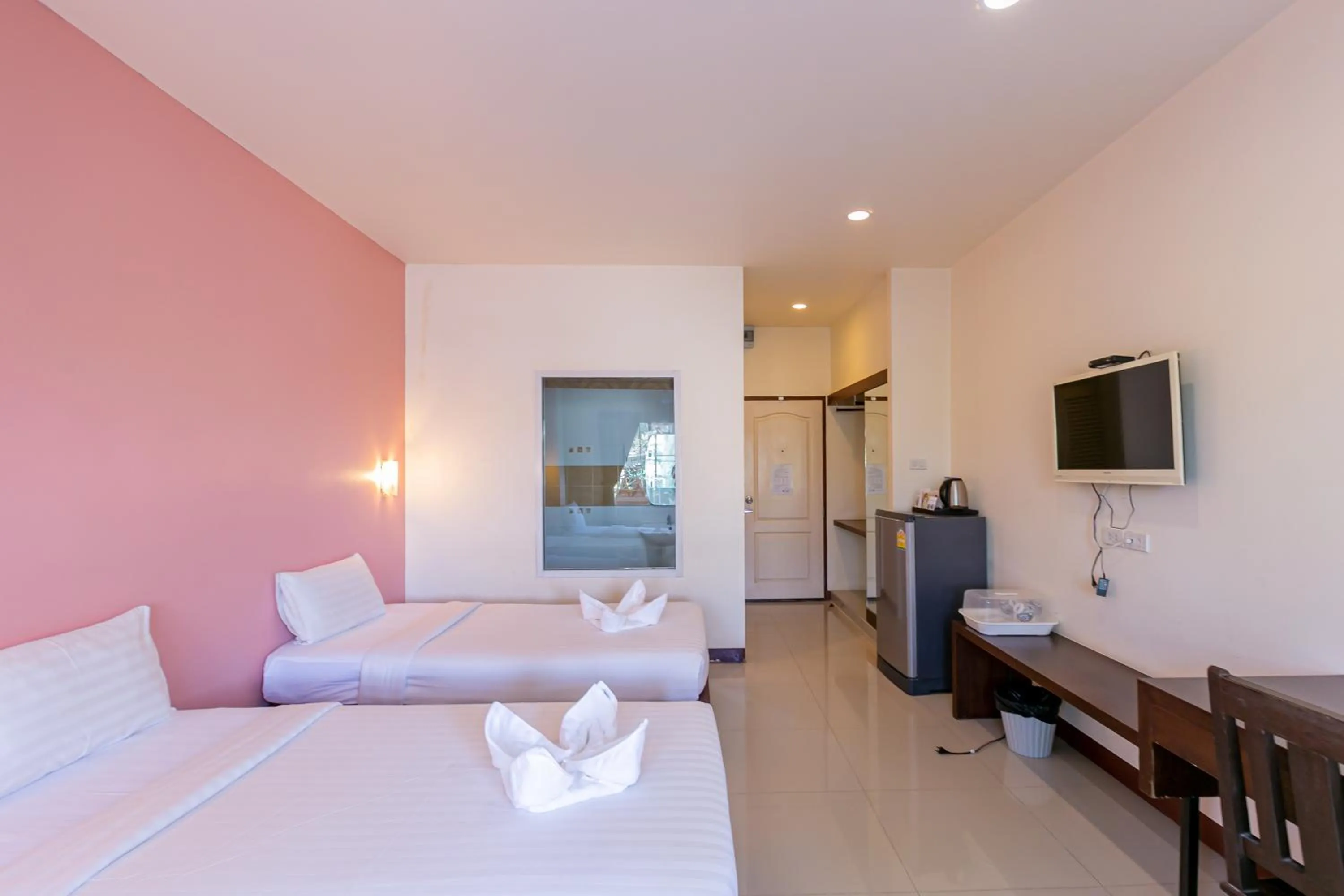 Bed in Panwalee Hotel