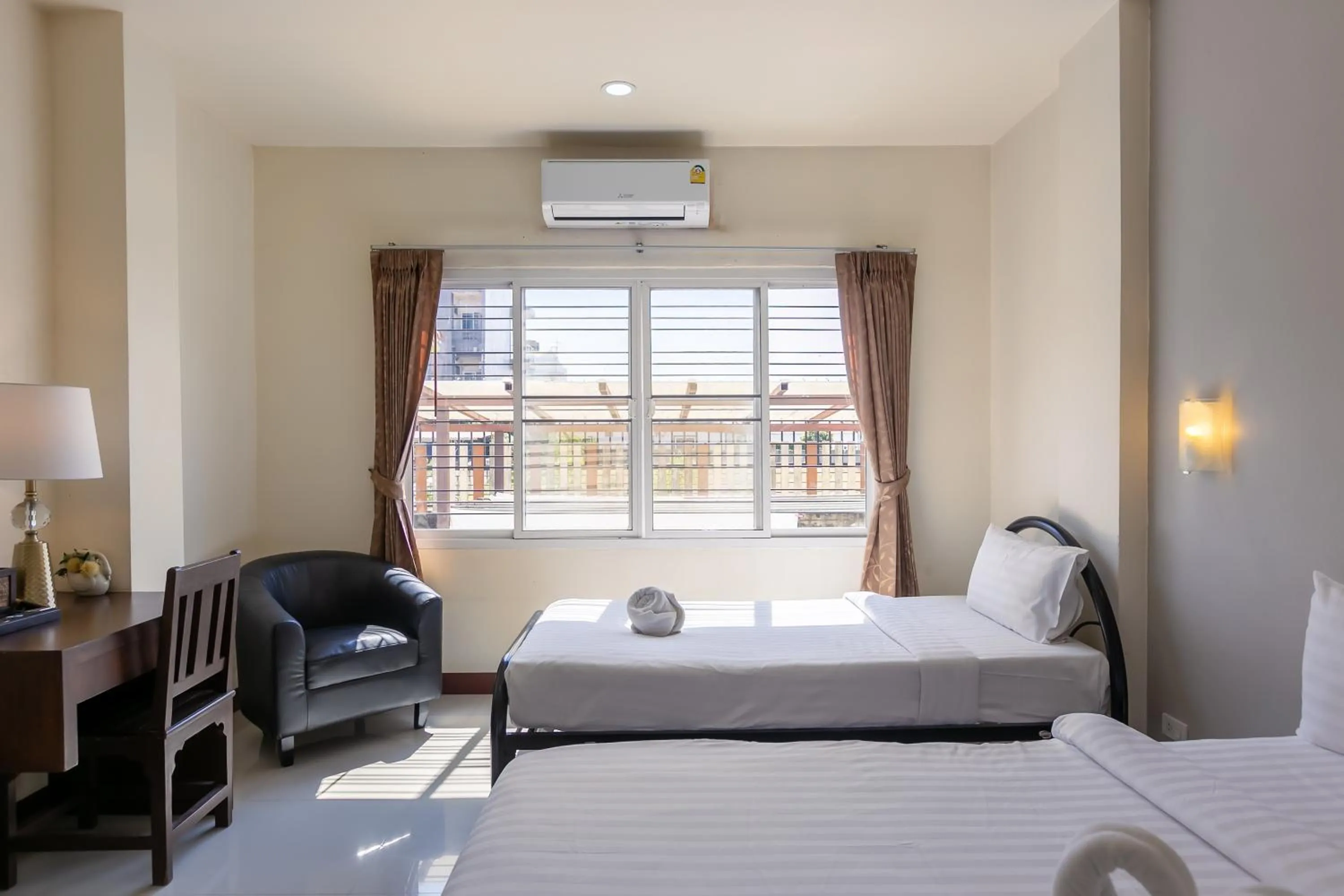 Bed in Panwalee Hotel