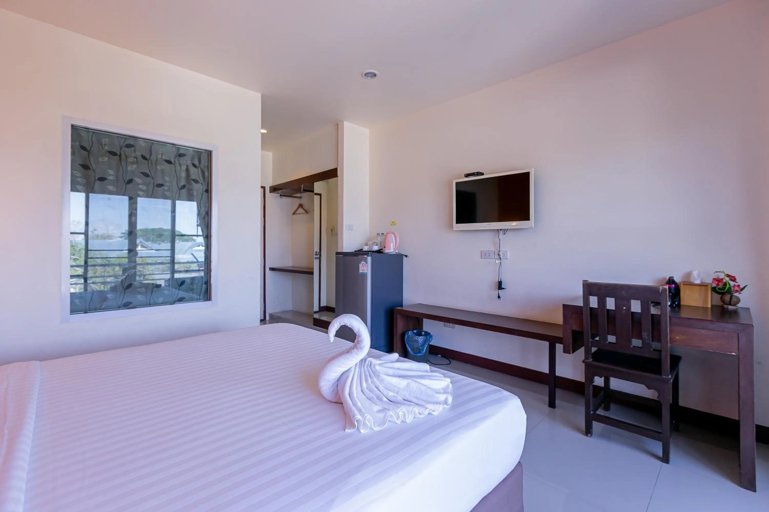 Bed in Panwalee Hotel