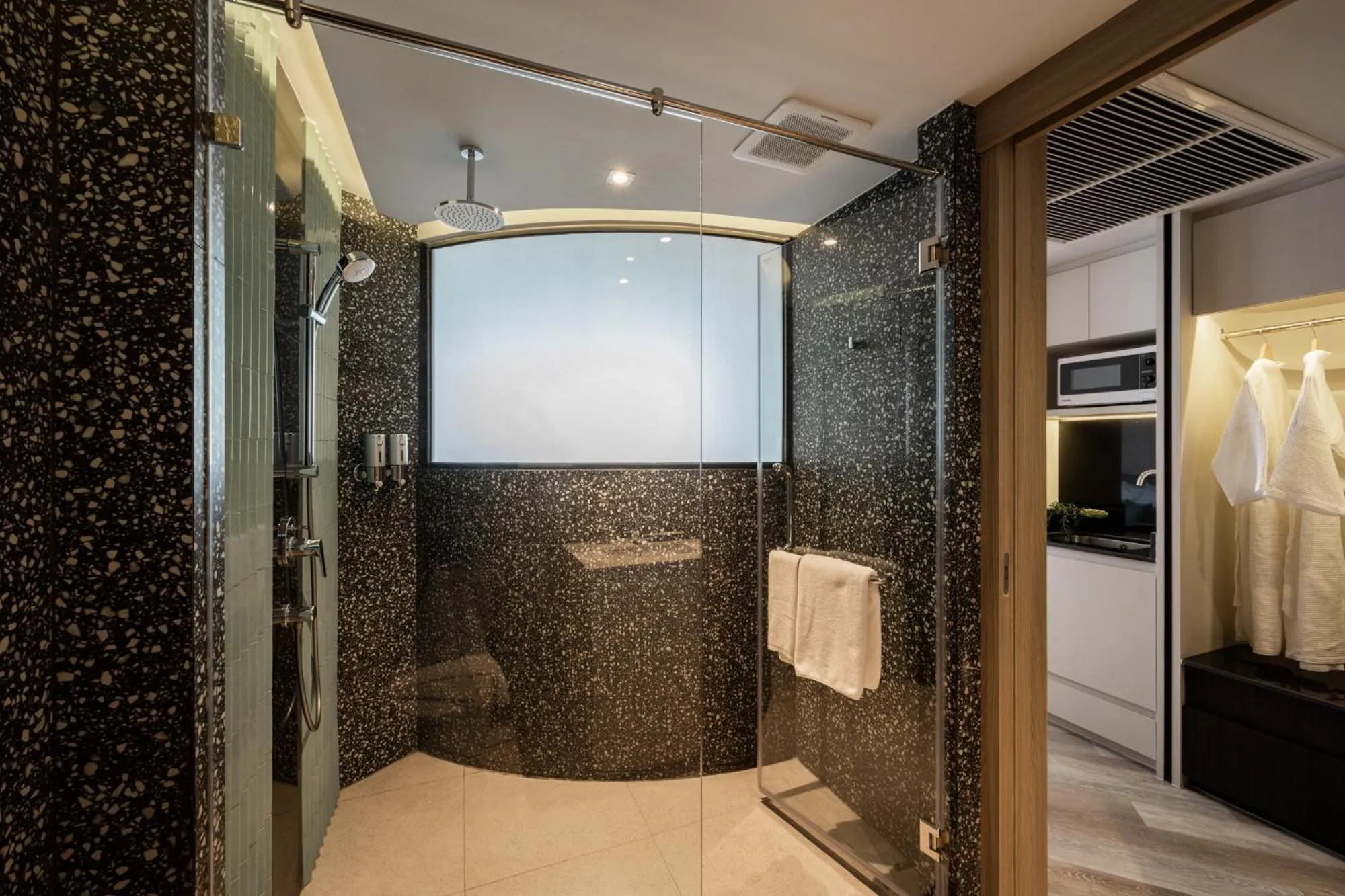 Shower in Seekers Finders Rama IV Hotel SureStay Collection by BW