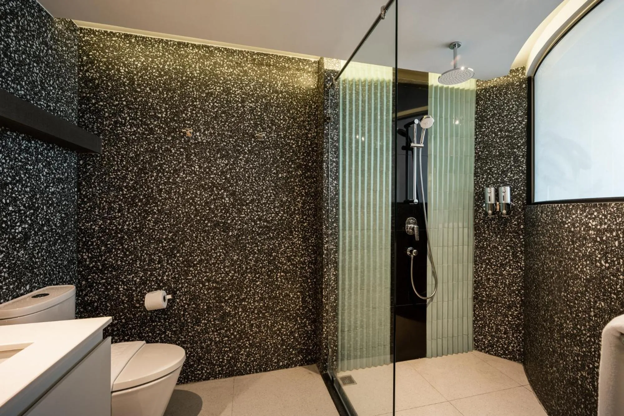 Shower in Seekers Finders Rama IV Hotel SureStay Collection by BW