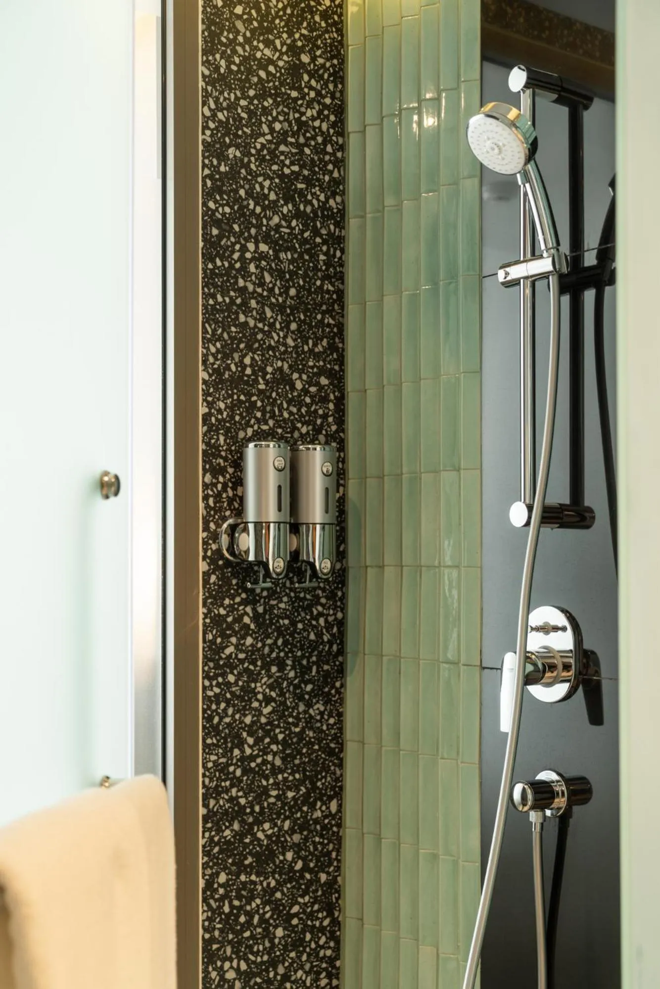 Shower in Seekers Finders Rama IV Hotel SureStay Collection by BW