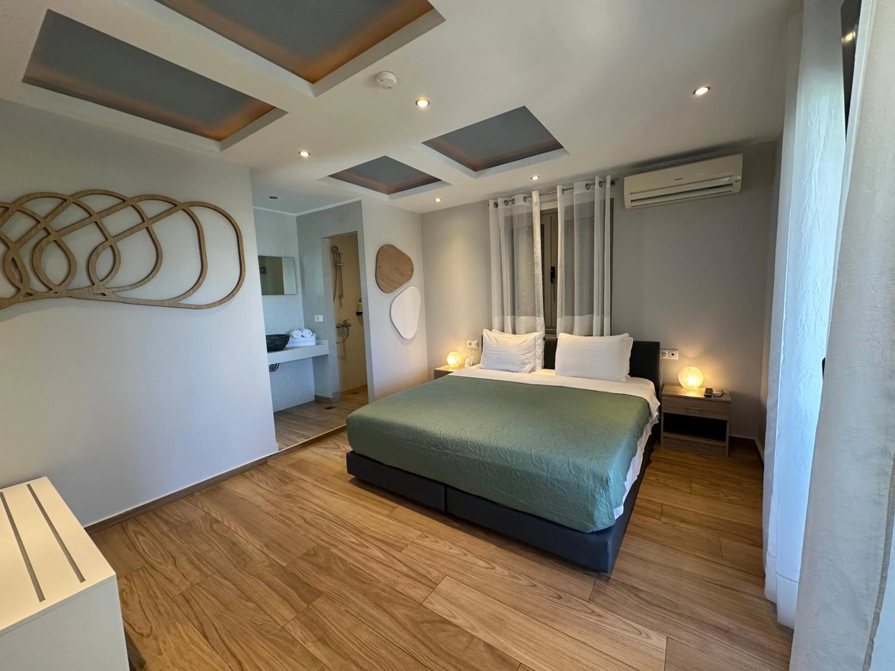 Bed in Evdokia Suites