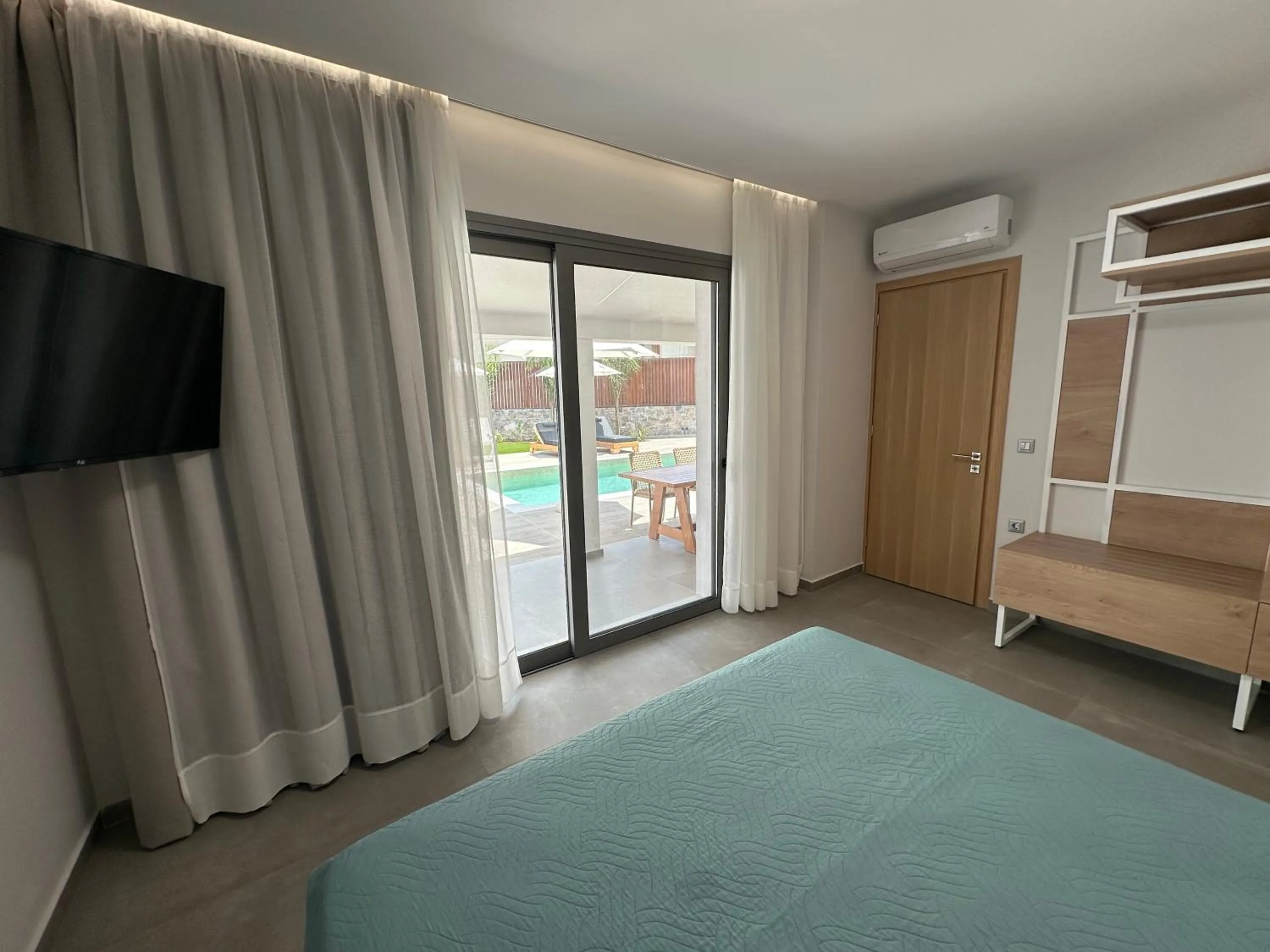 Bed in Evdokia Suites