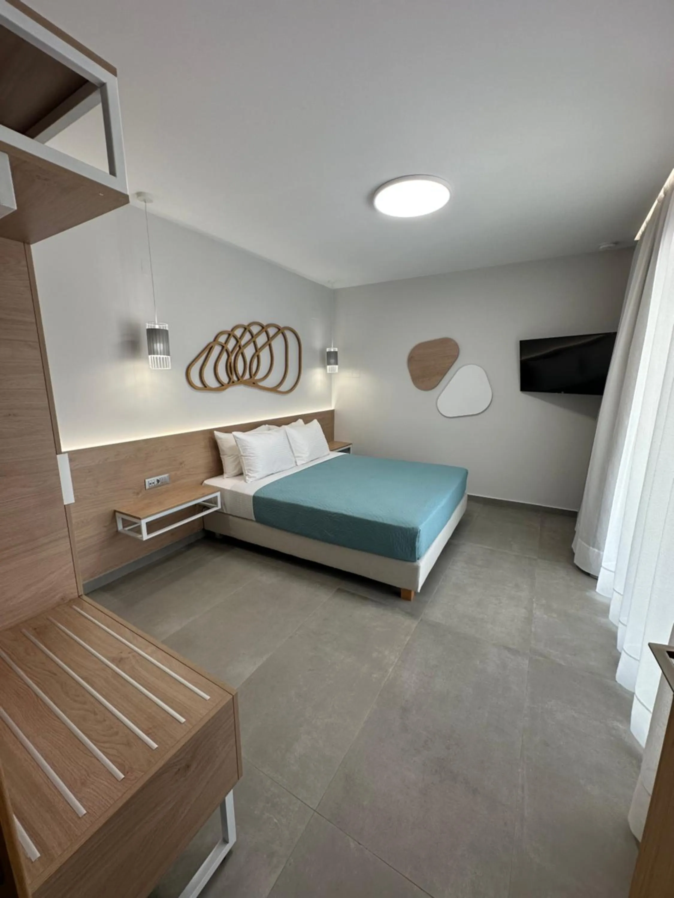 Bed in Evdokia Suites