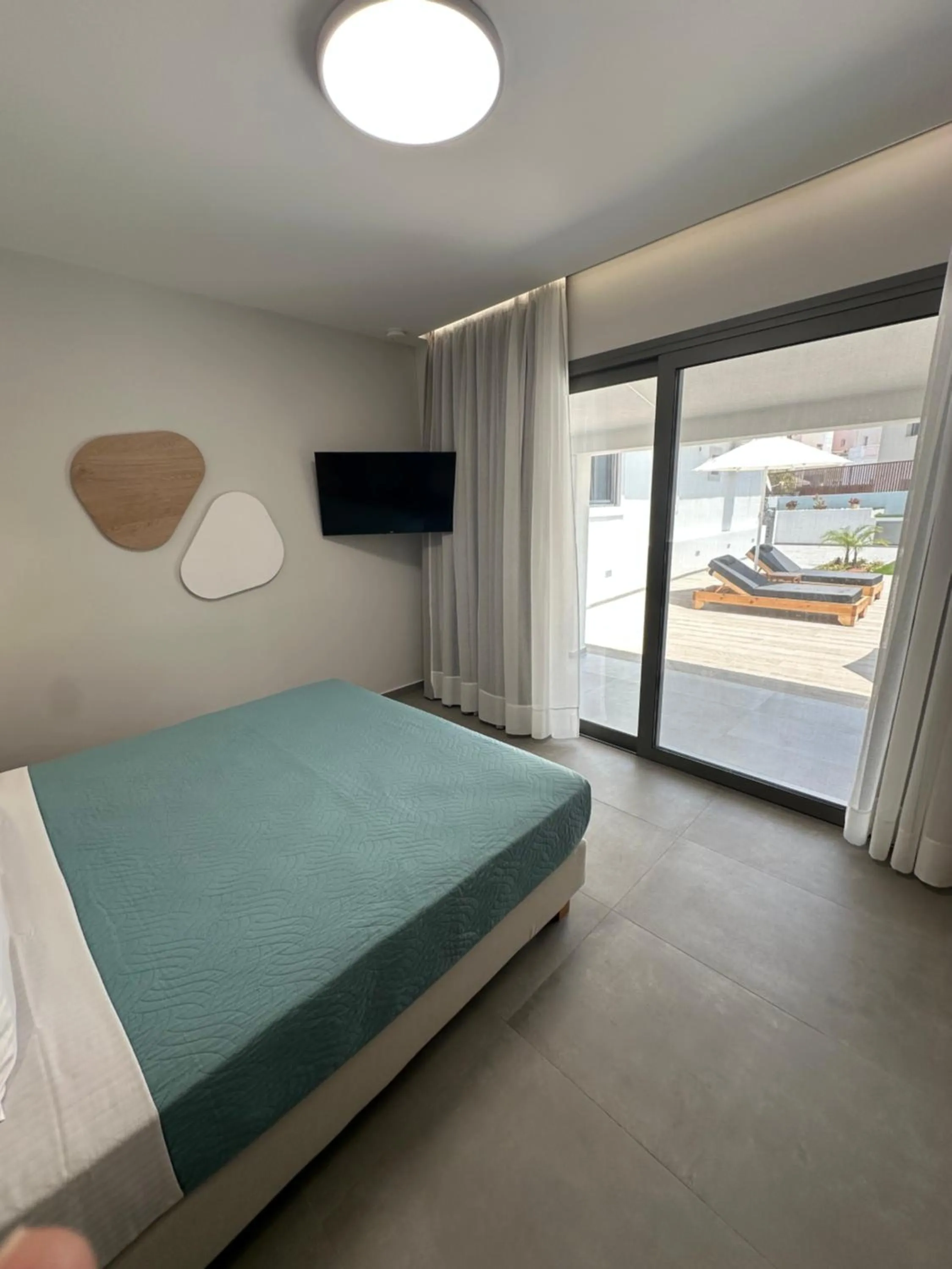 Bed in Evdokia Suites