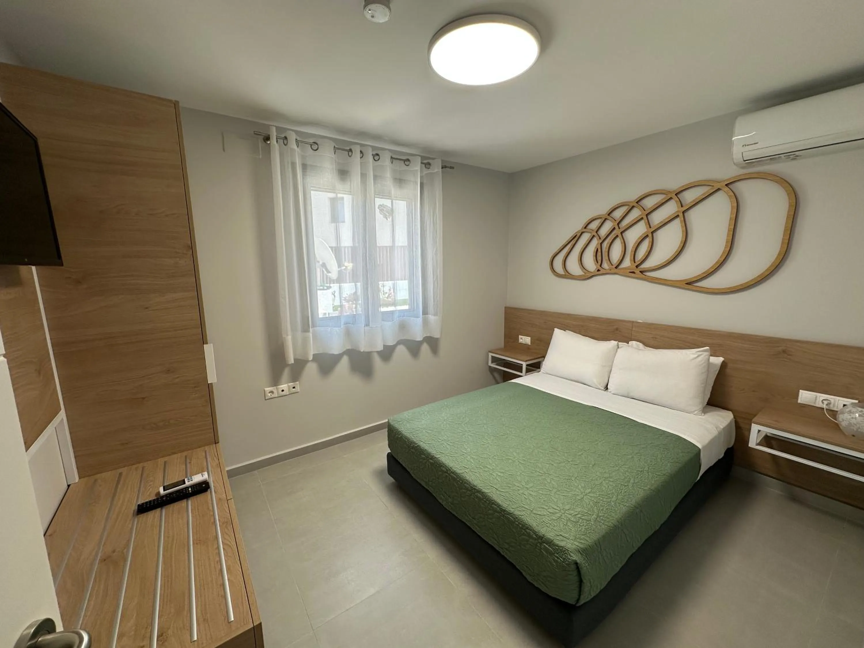 Bed in Evdokia Suites