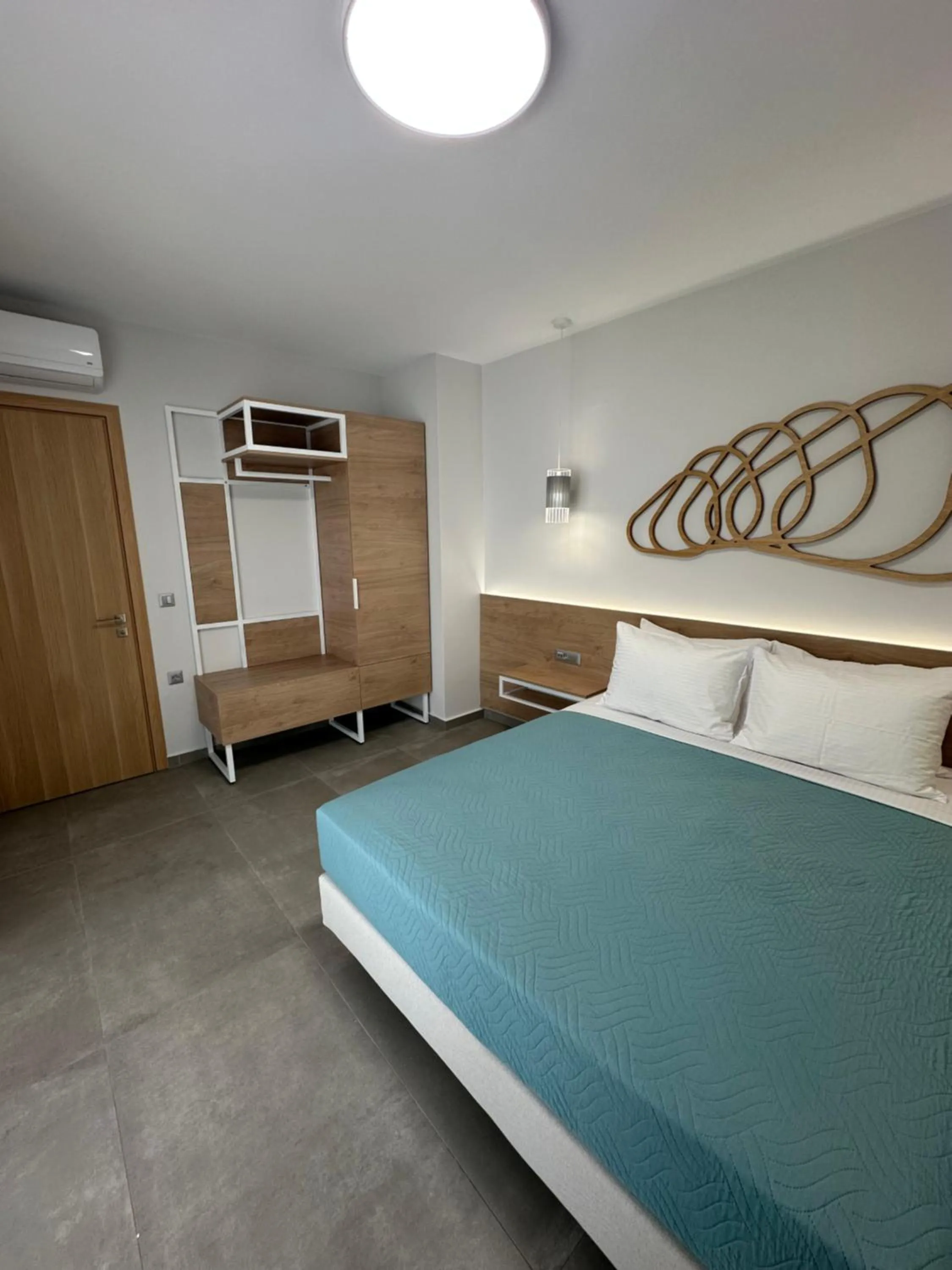 Bed in Evdokia Suites