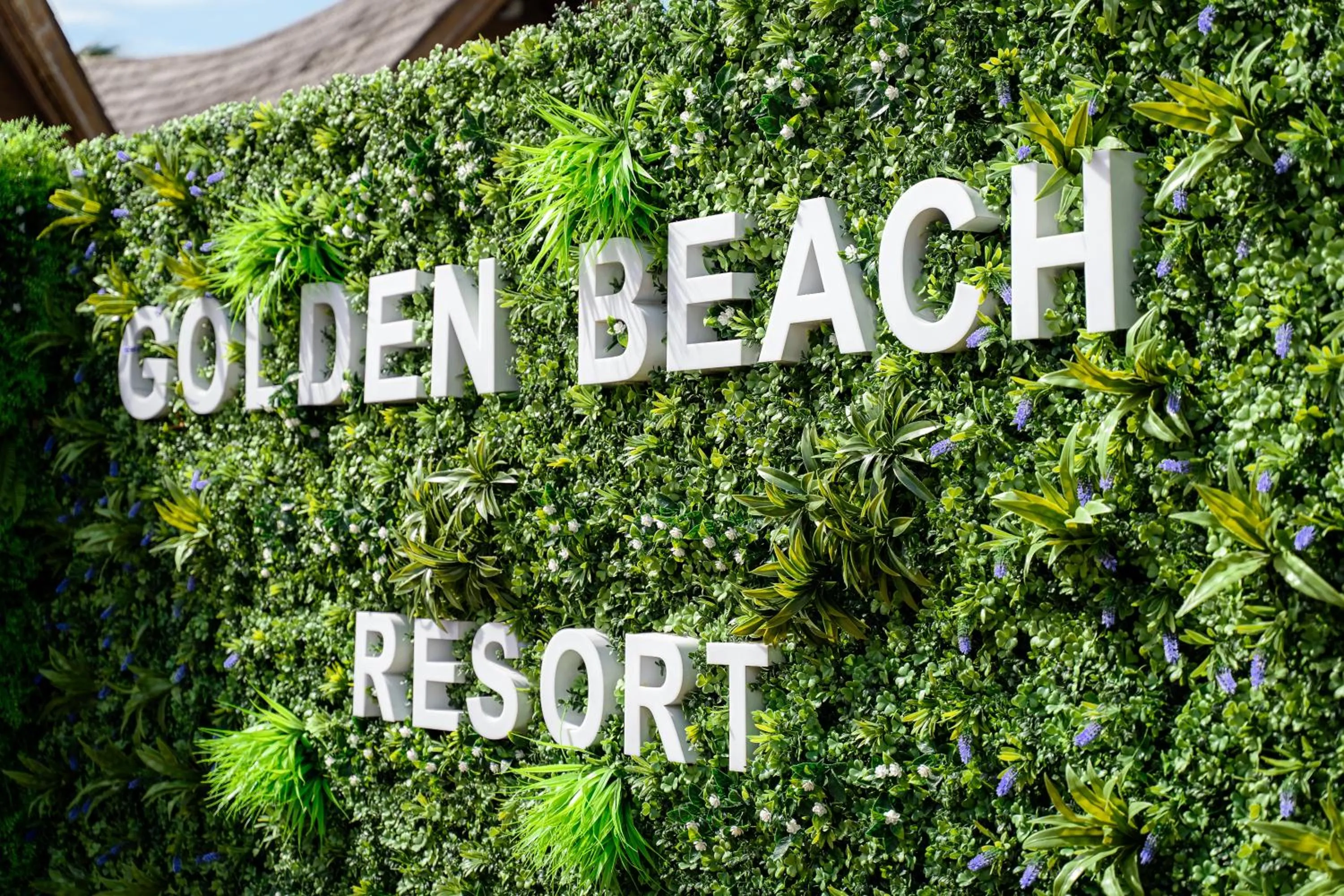 Property logo or sign in Golden Beach Resort