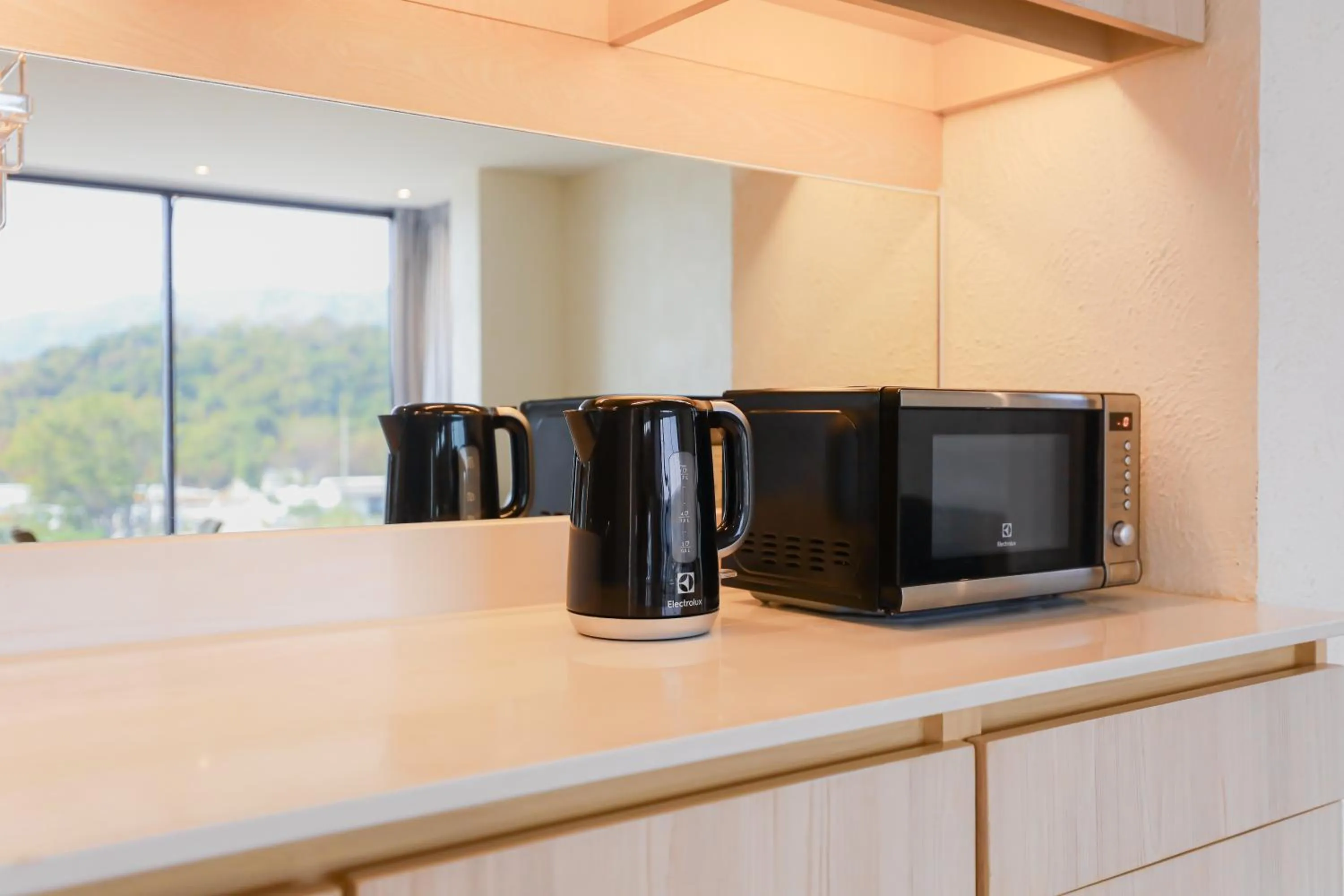 Kitchen or kitchenette in Balcony Seaside Sriracha Hotel & Serviced Apartments