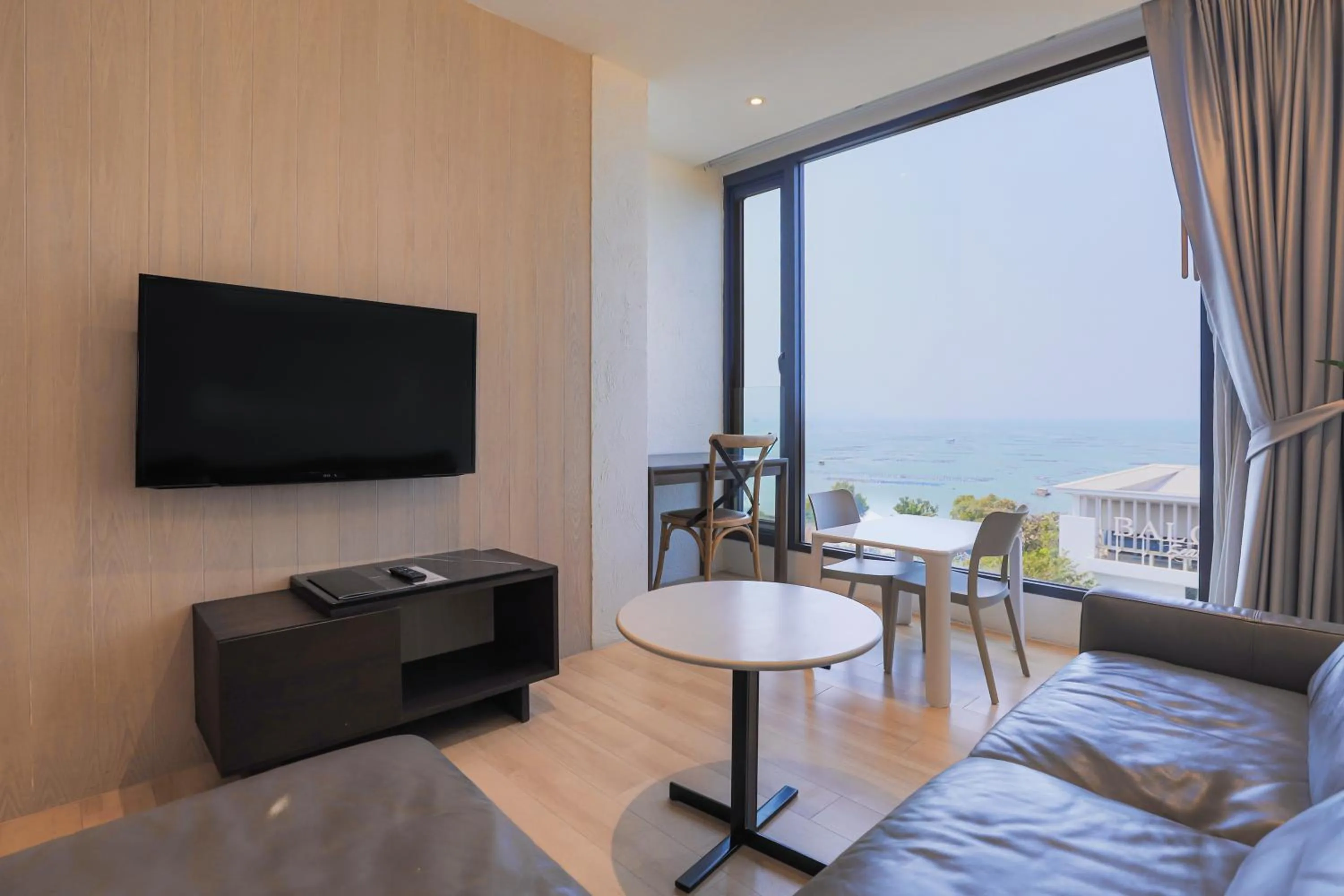 TV and multimedia in Balcony Seaside Sriracha Hotel & Serviced Apartments