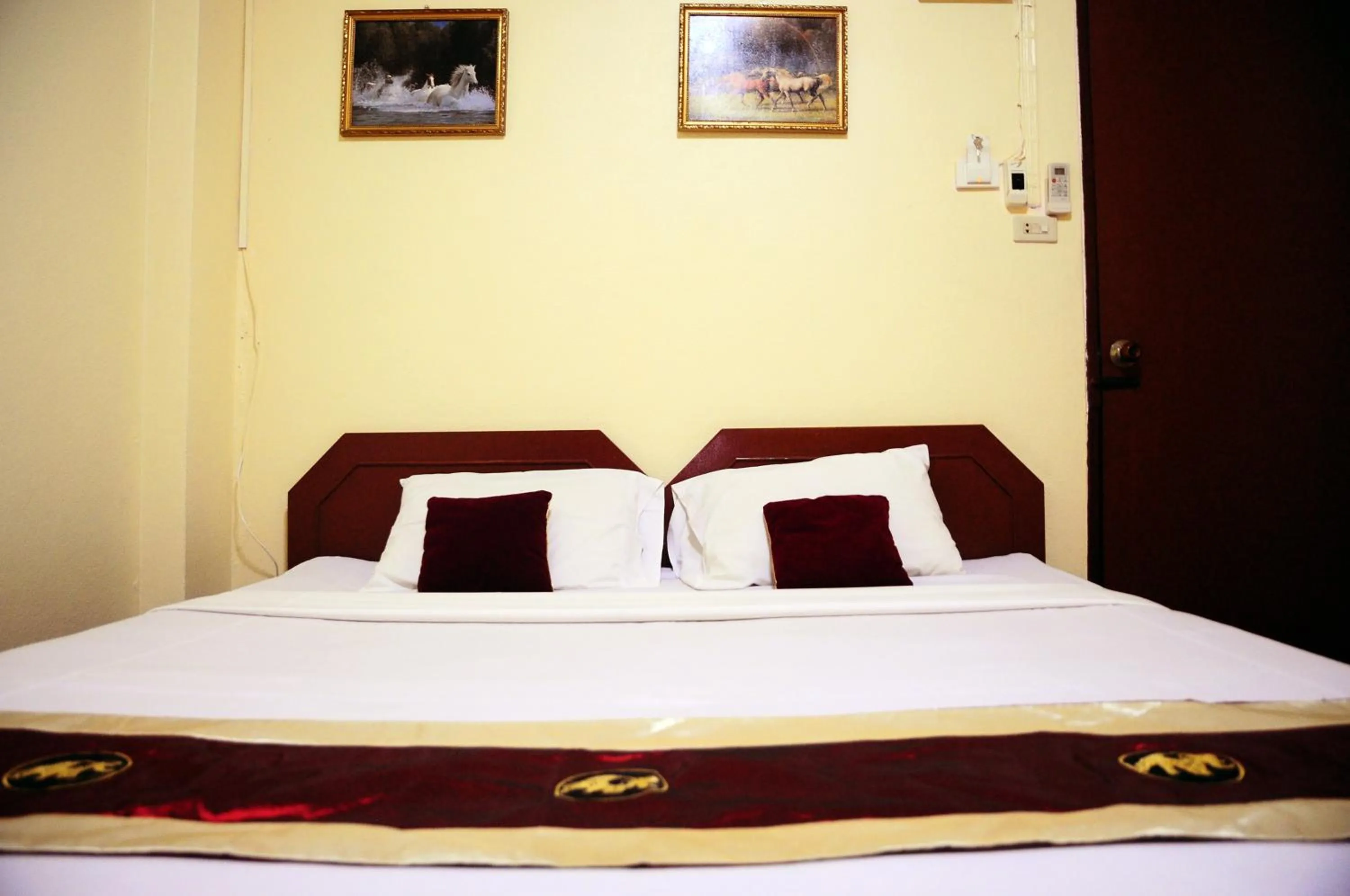 Bed in Choktawee Mansion Lampang