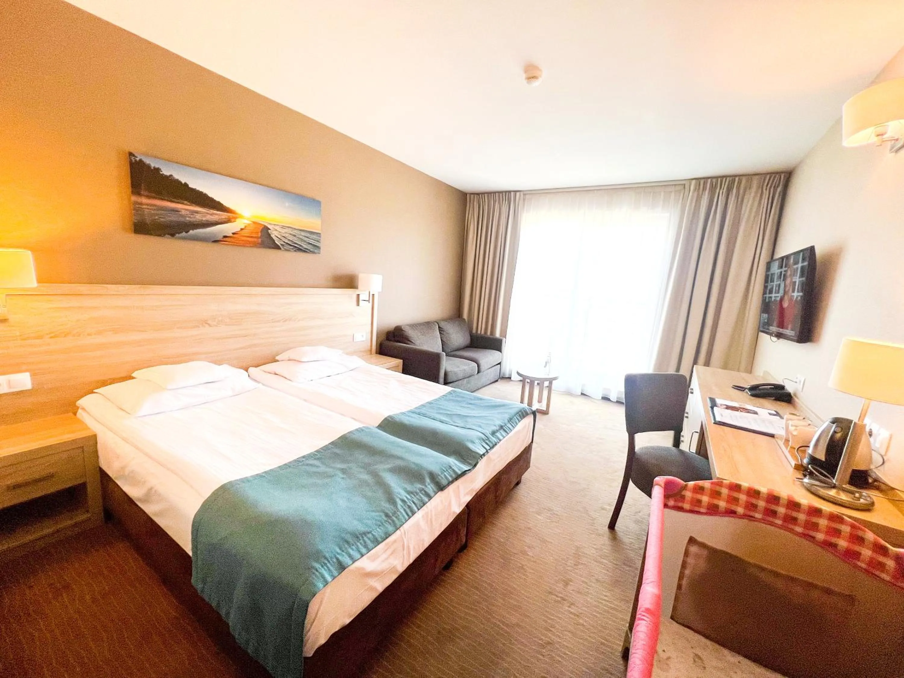 Bed in Tristan Hotel & SPA