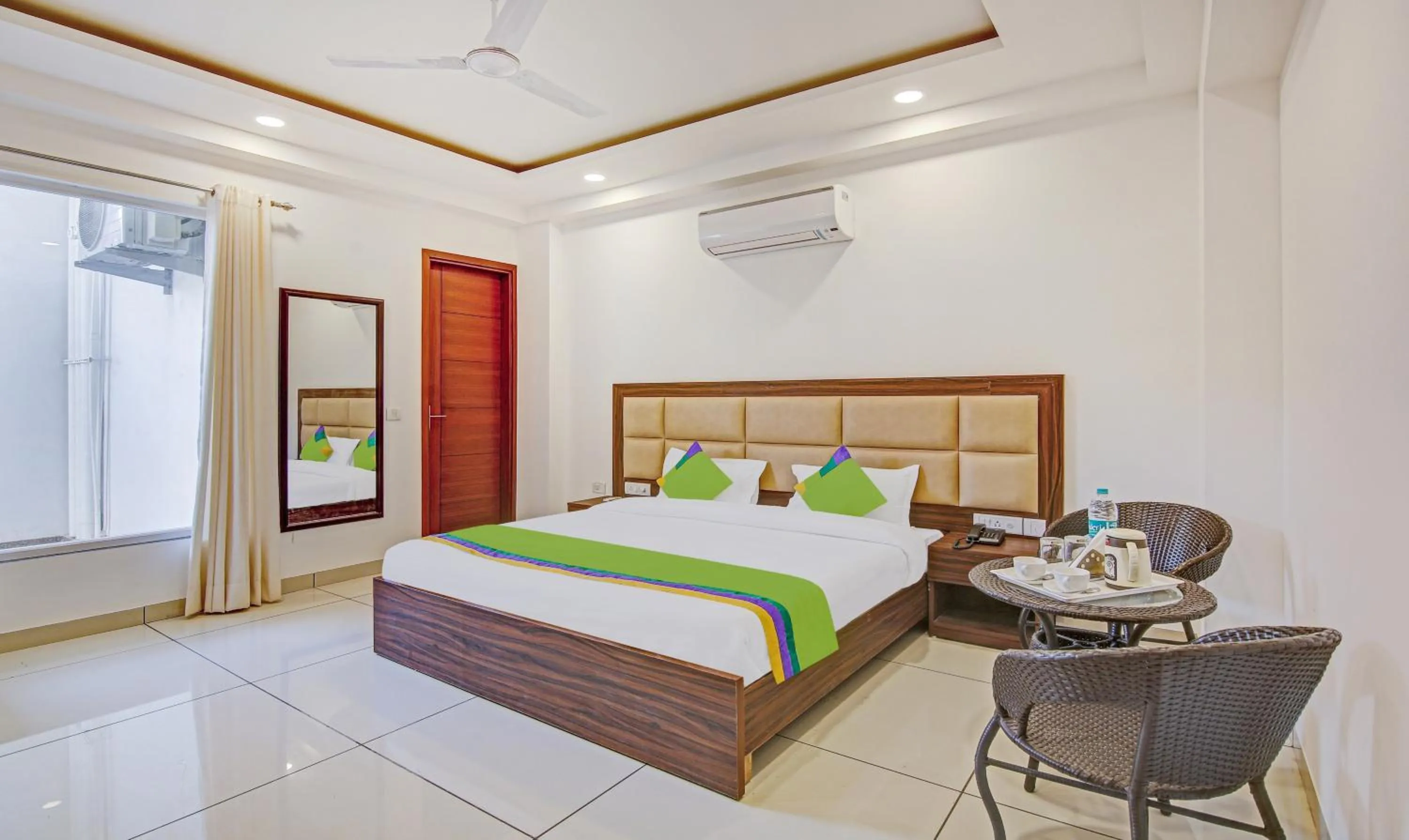 Bed in Treebo Aviraj Inn