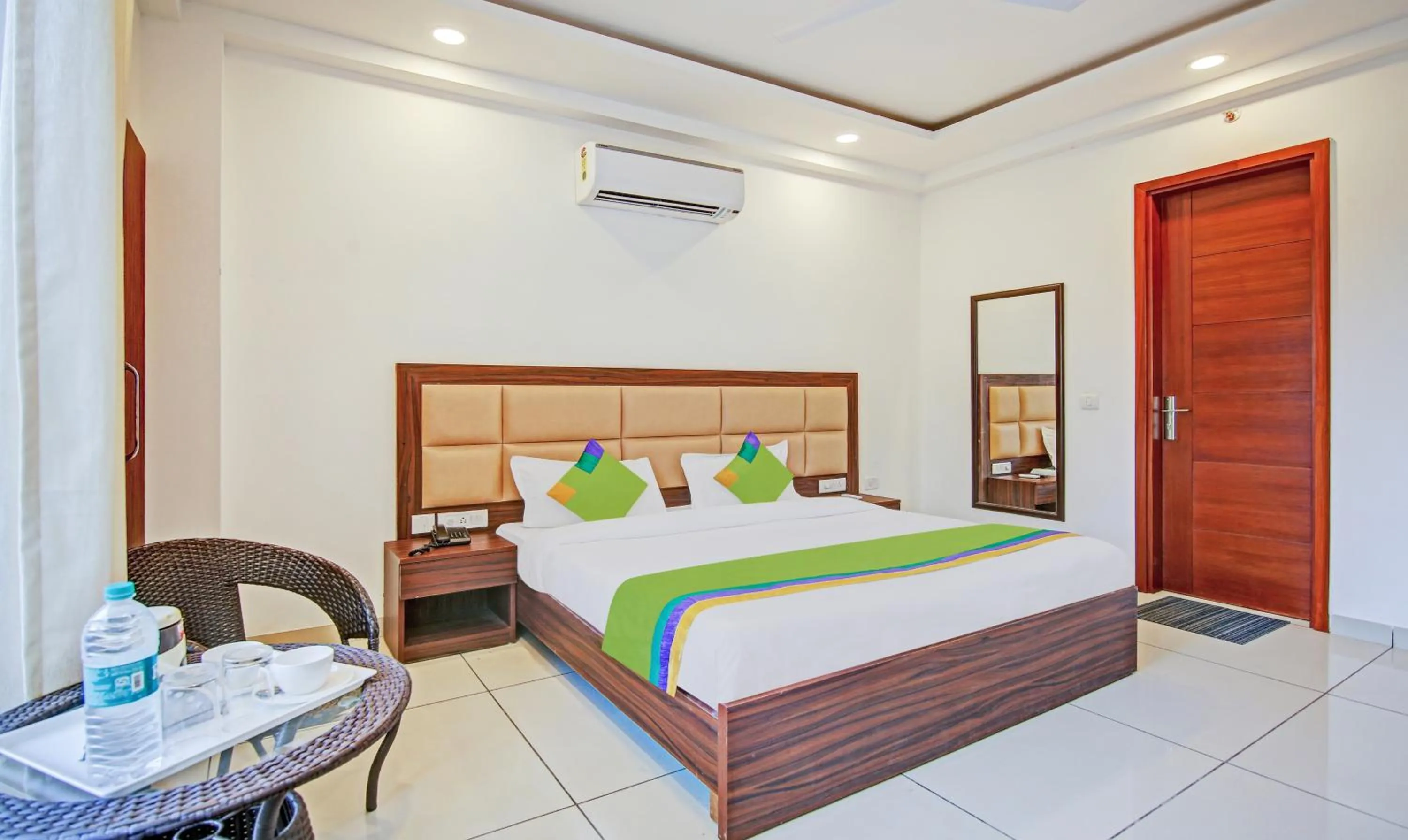 Bed in Treebo Aviraj Inn