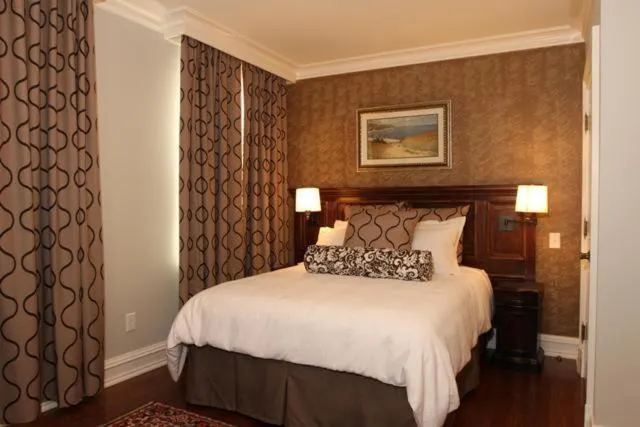 Bed in Guest House at Norwalk Inn