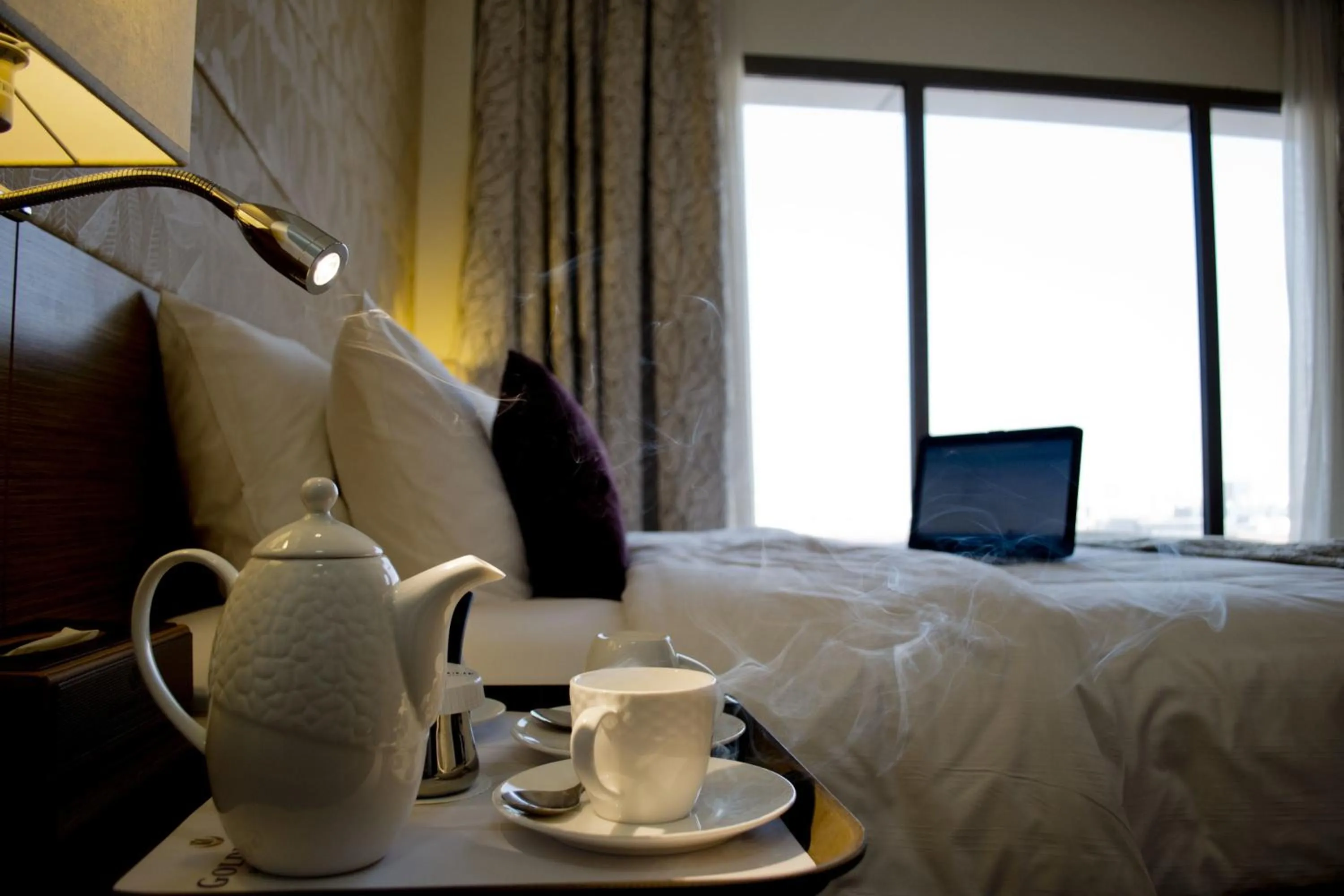 Bed in Golden Tulip Dammam Corniche Hotel