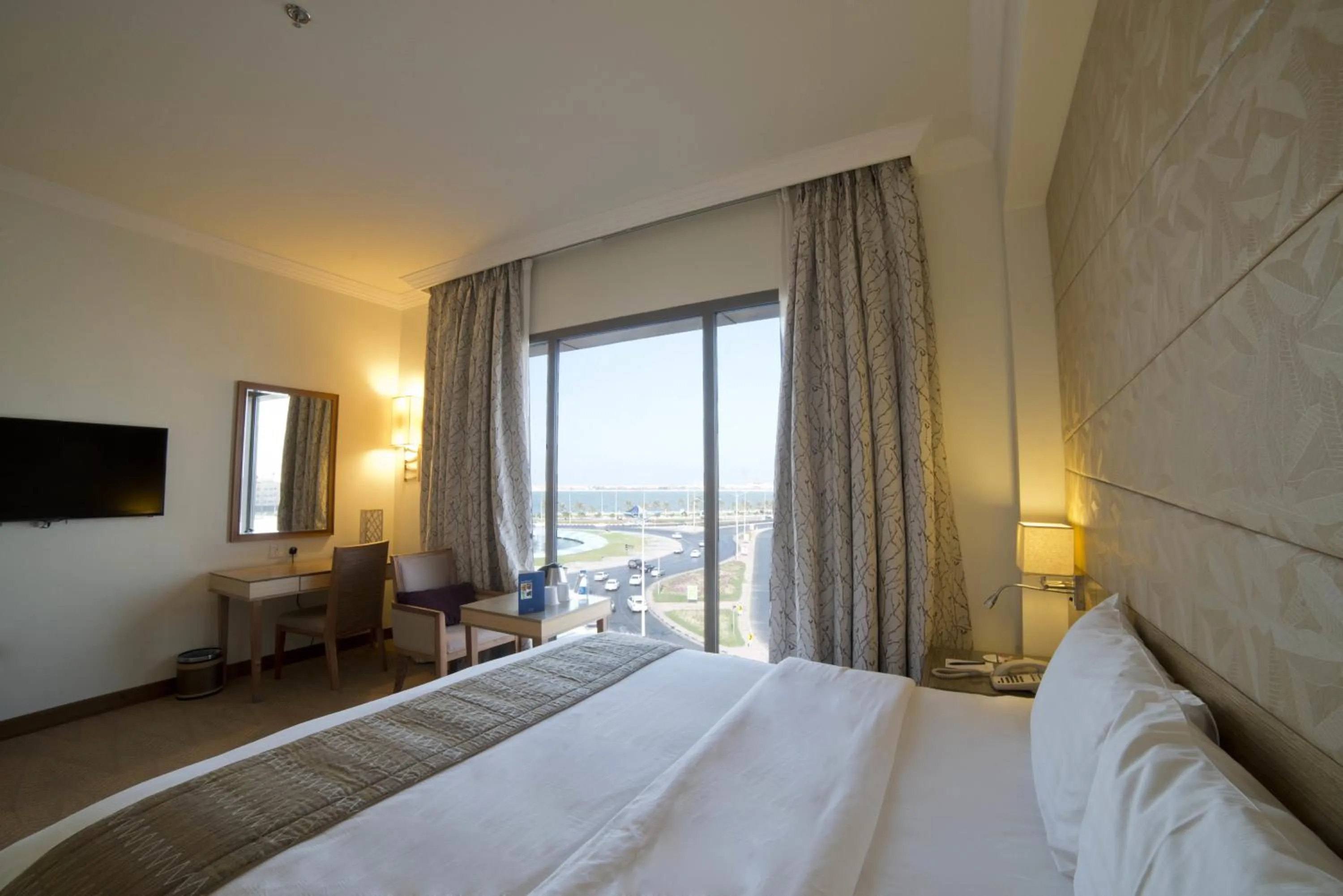 View (from property/room), Bed in Golden Tulip Dammam Corniche Hotel