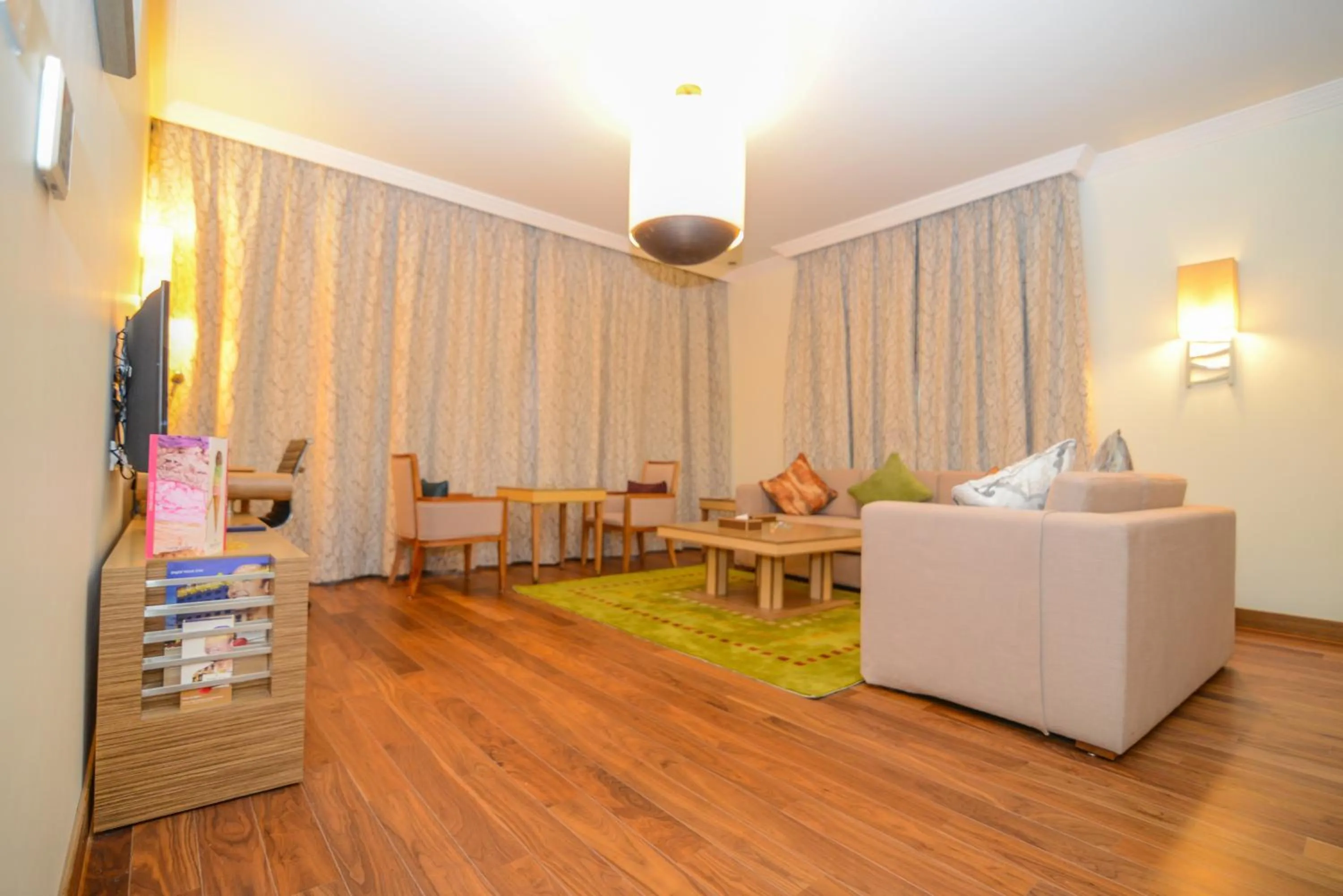 Living room in Golden Tulip Dammam Corniche Hotel