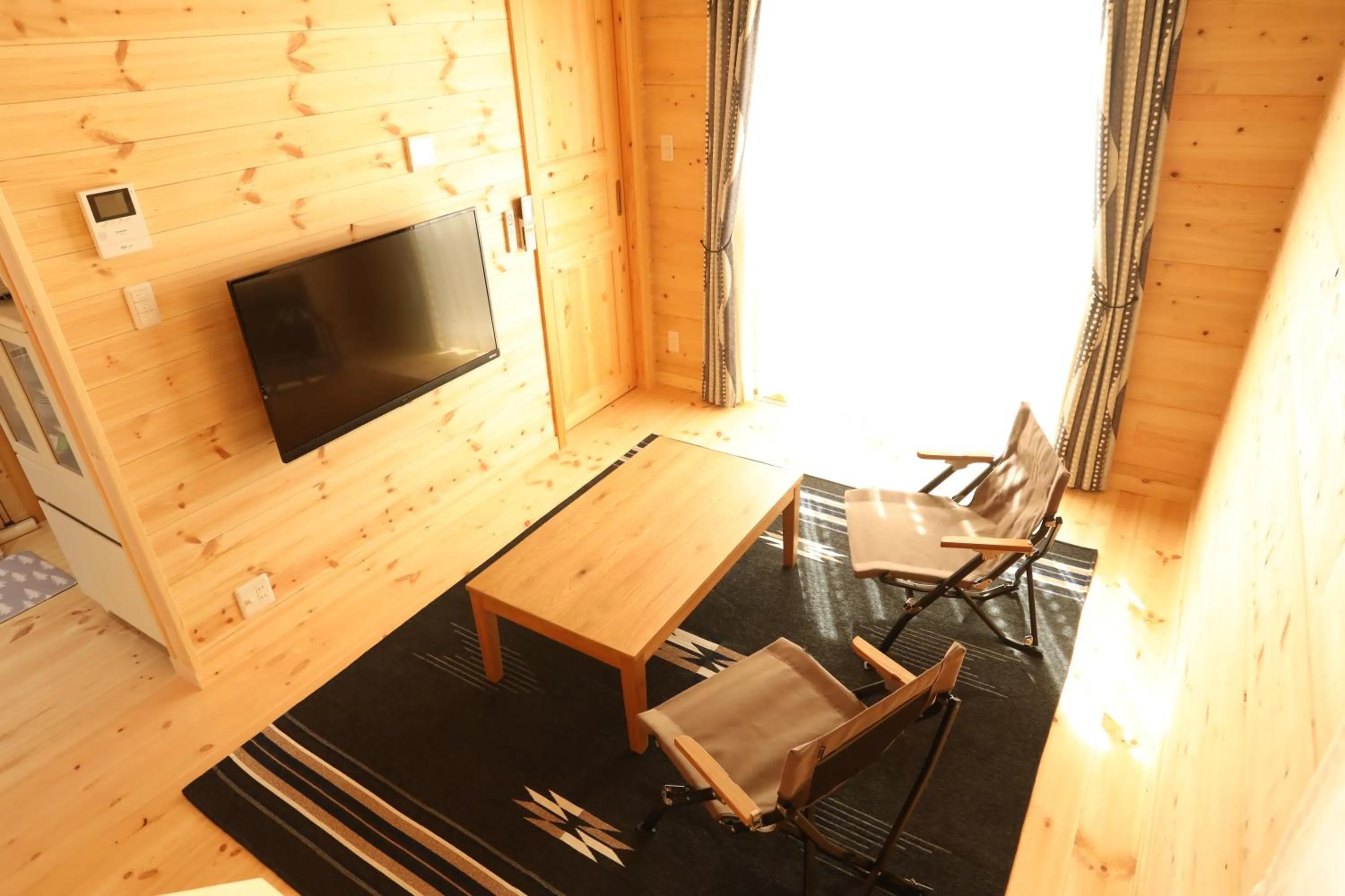 Living room in Log Cottage 白馬KIITOS